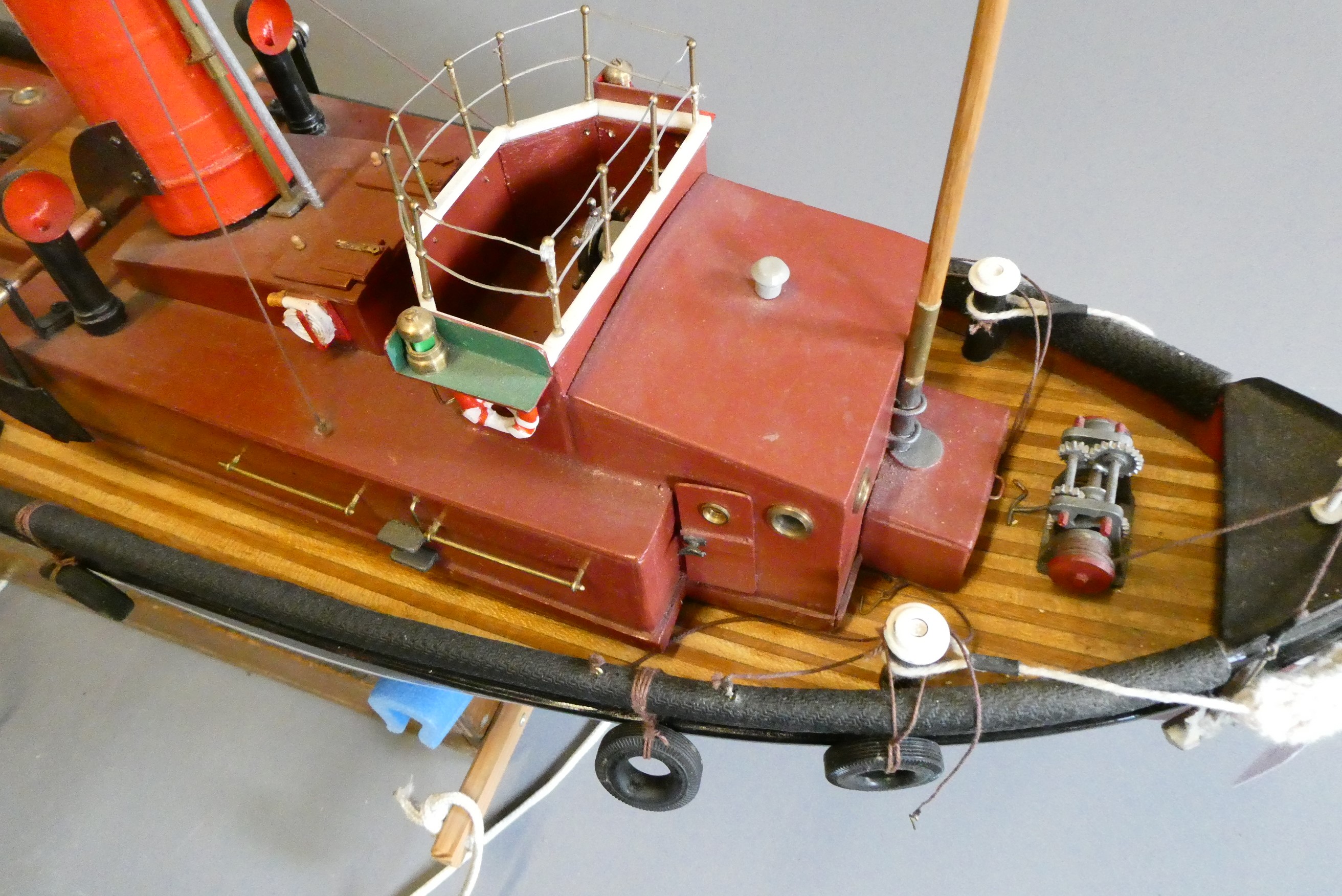 An electric motorised tugboat "Tollman" Image
