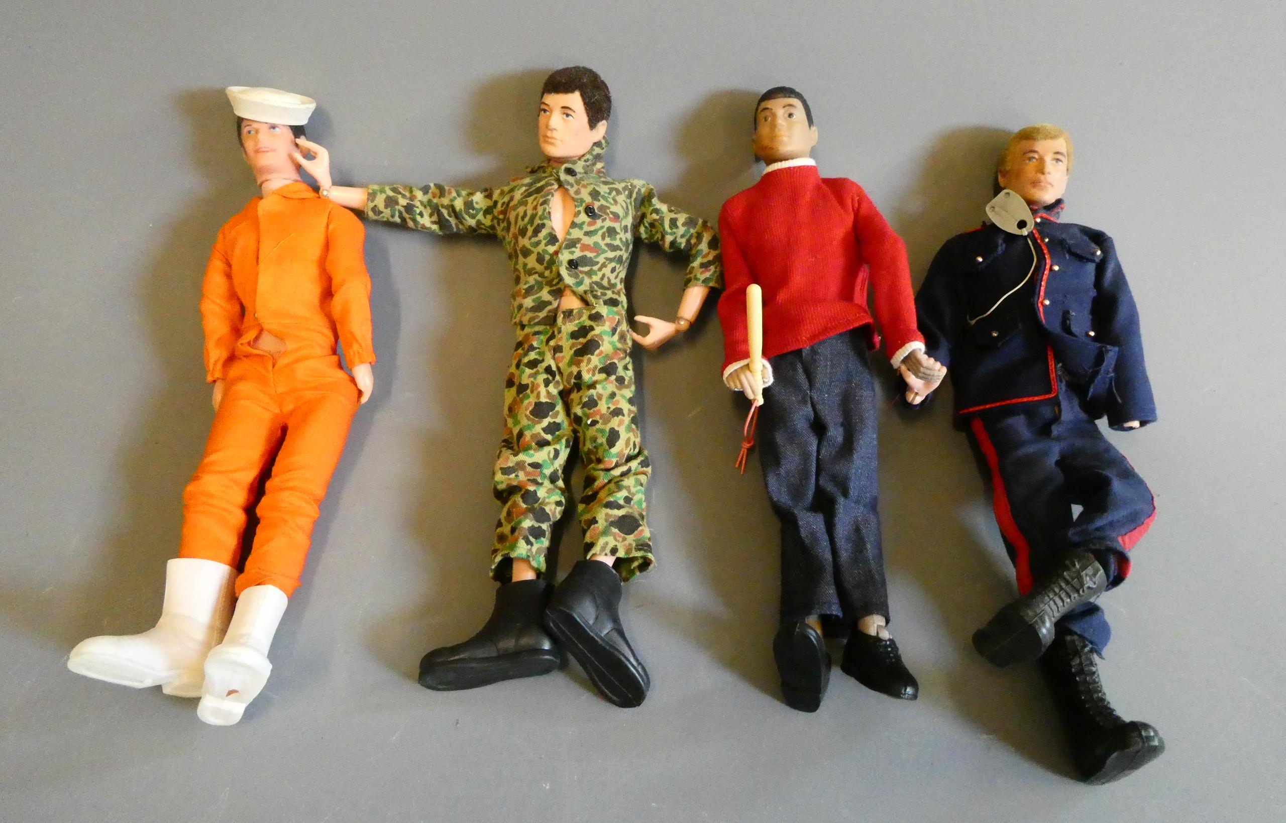 Action dolls including two Action men with fuzzy hair and two similar male dolls Image