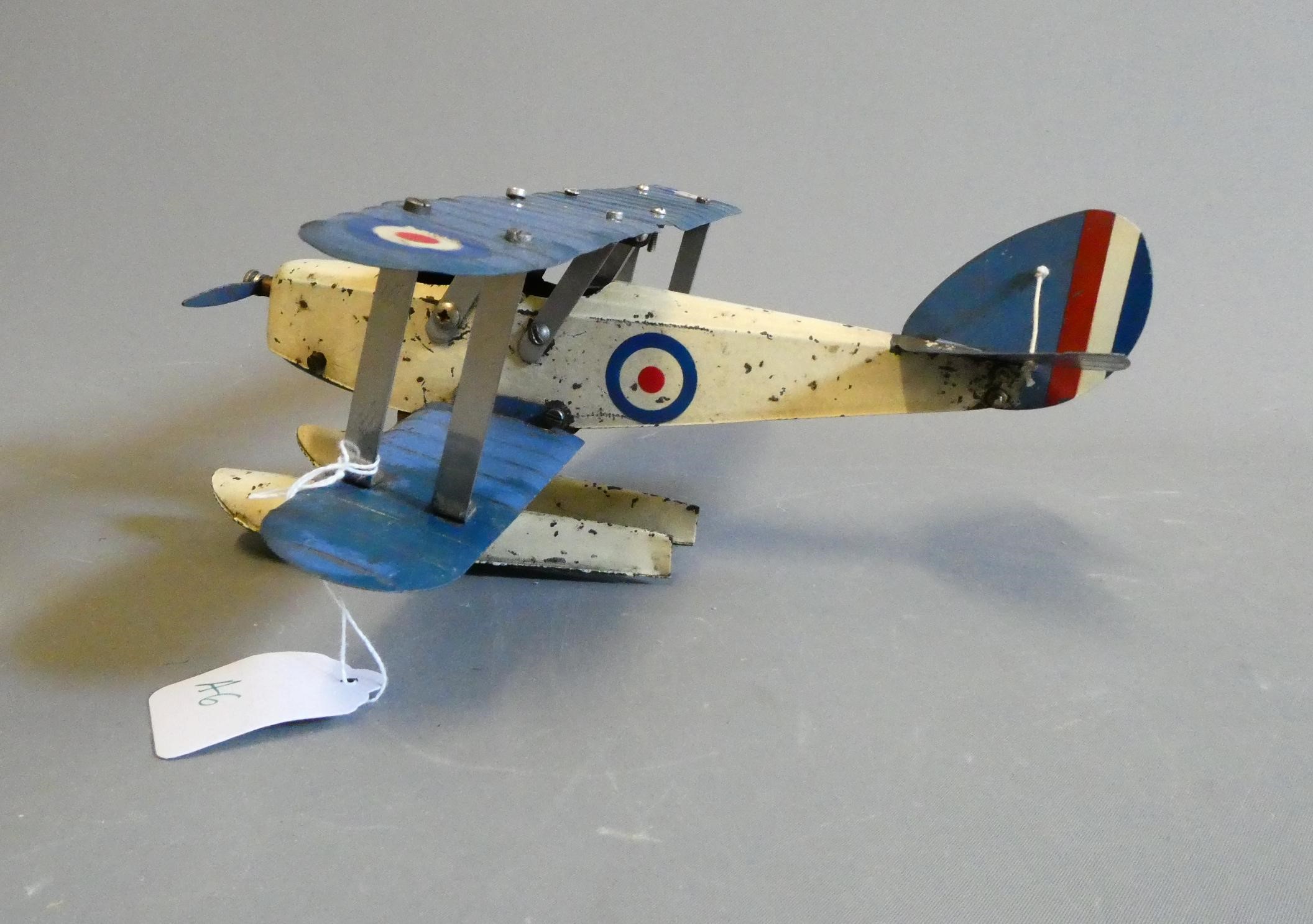 Meccano No1 sea plane finished in blue and white, fitted with floats. Some overpainting, some paint Image