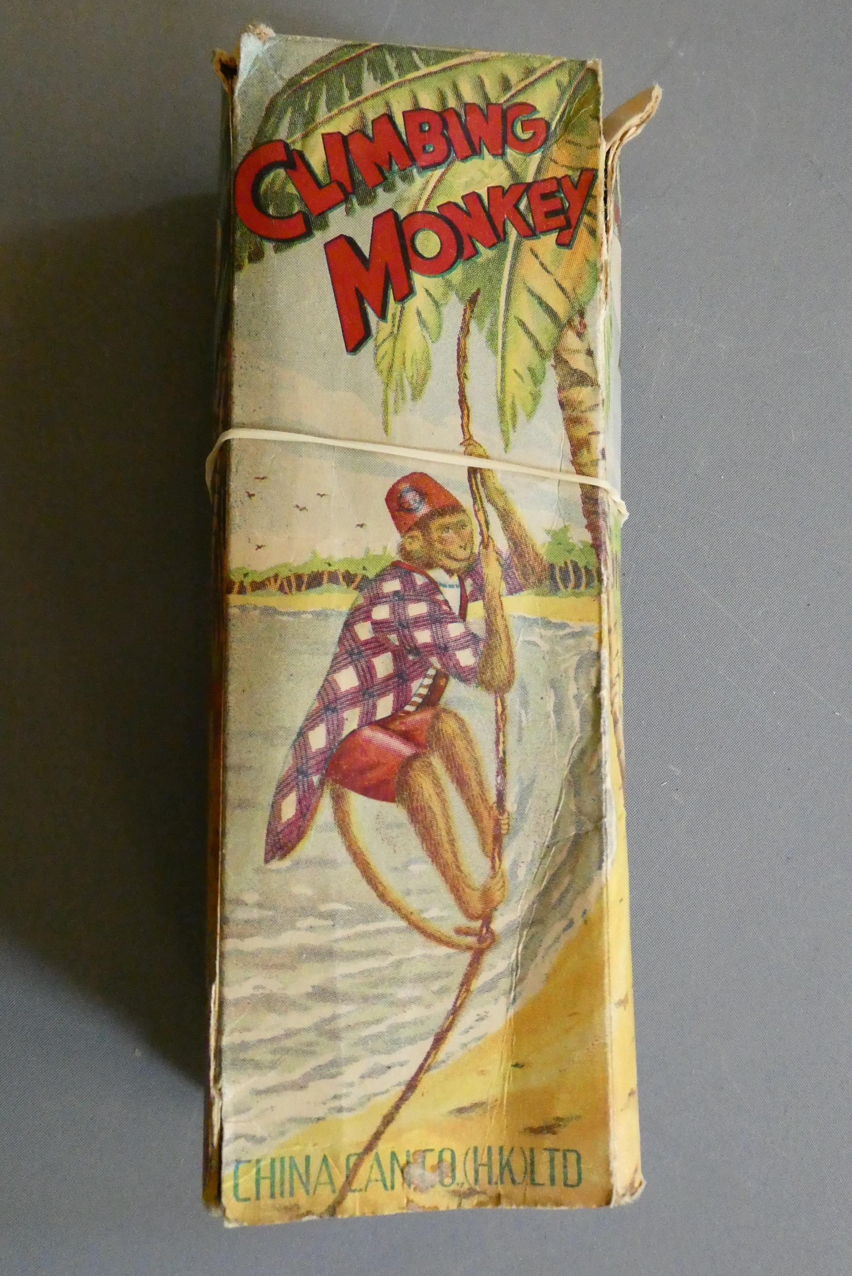 Early China made (Hong Kong) tin-plate litho-printed climbing monkey. Box fair, toy good (Est. plus Image