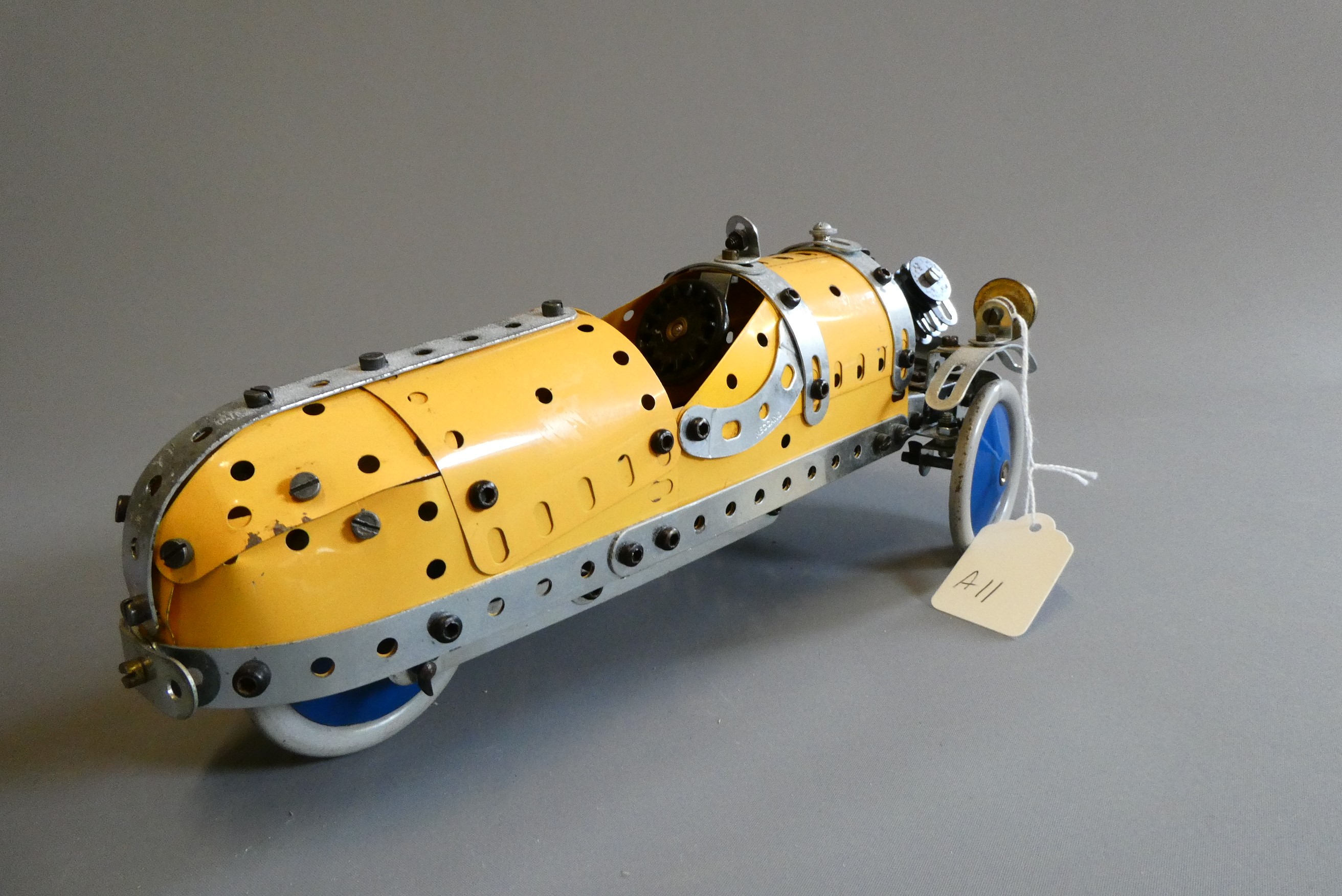 Meccano 1960s yellow/silver shop display model of the Morgan 3-wheeler car, some aging to plate Image