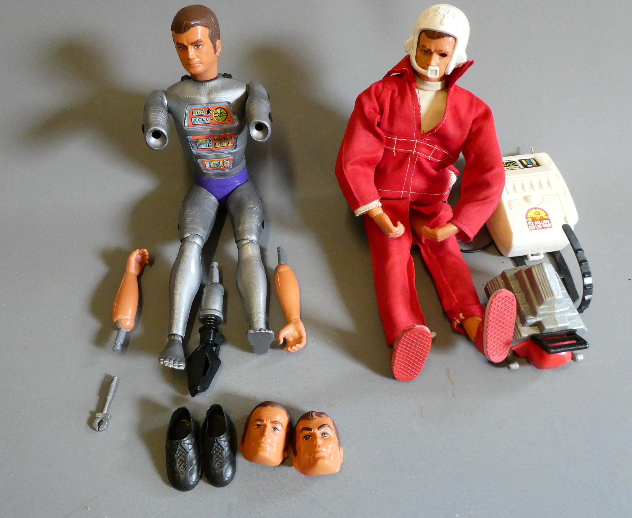Two Six Million Dollar Man dolls, one in red overalls and the other as Maskatron figure. Fair (Est. Image