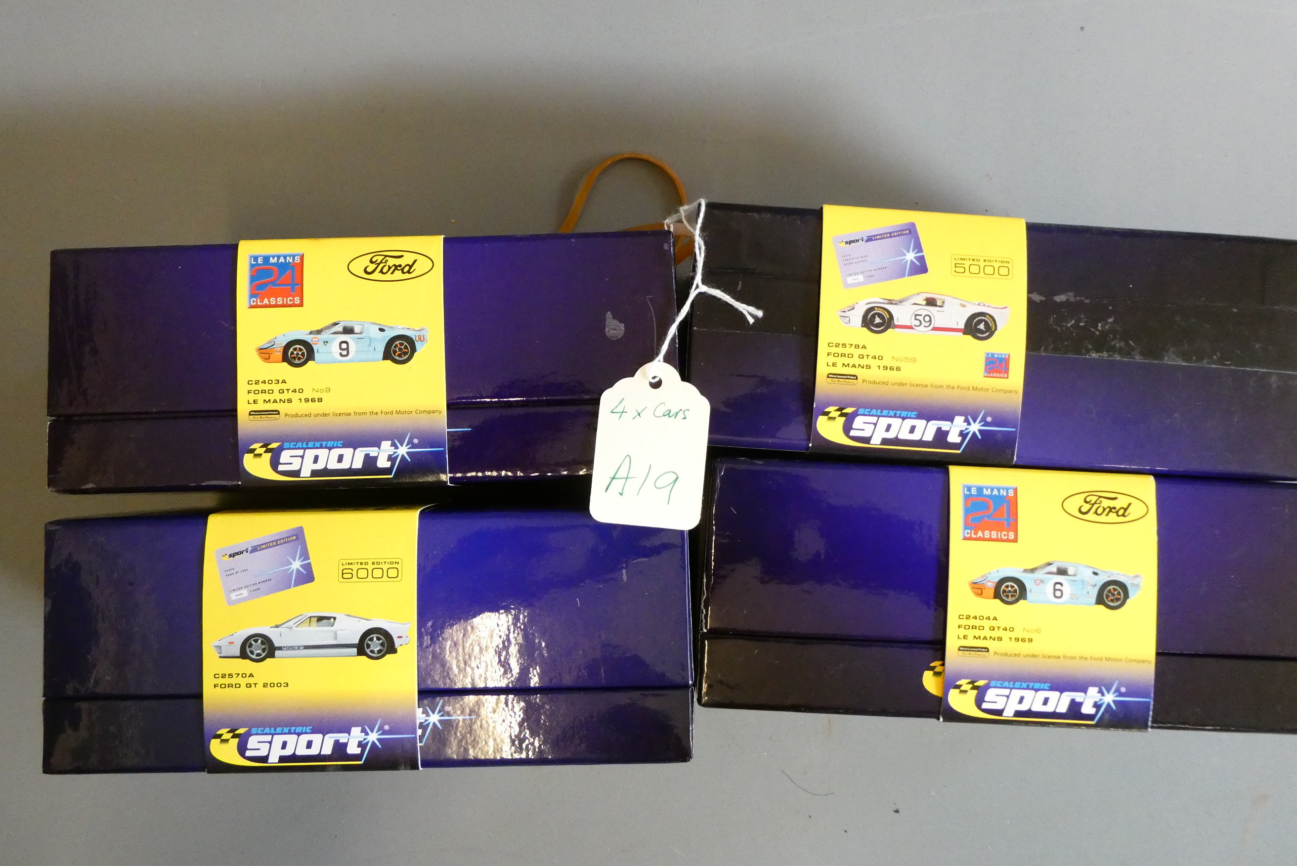 Four Scalextric race cars comprising four Ford Capri GT40s, boxed, mint (Est. plus 24% premium inc. Image
