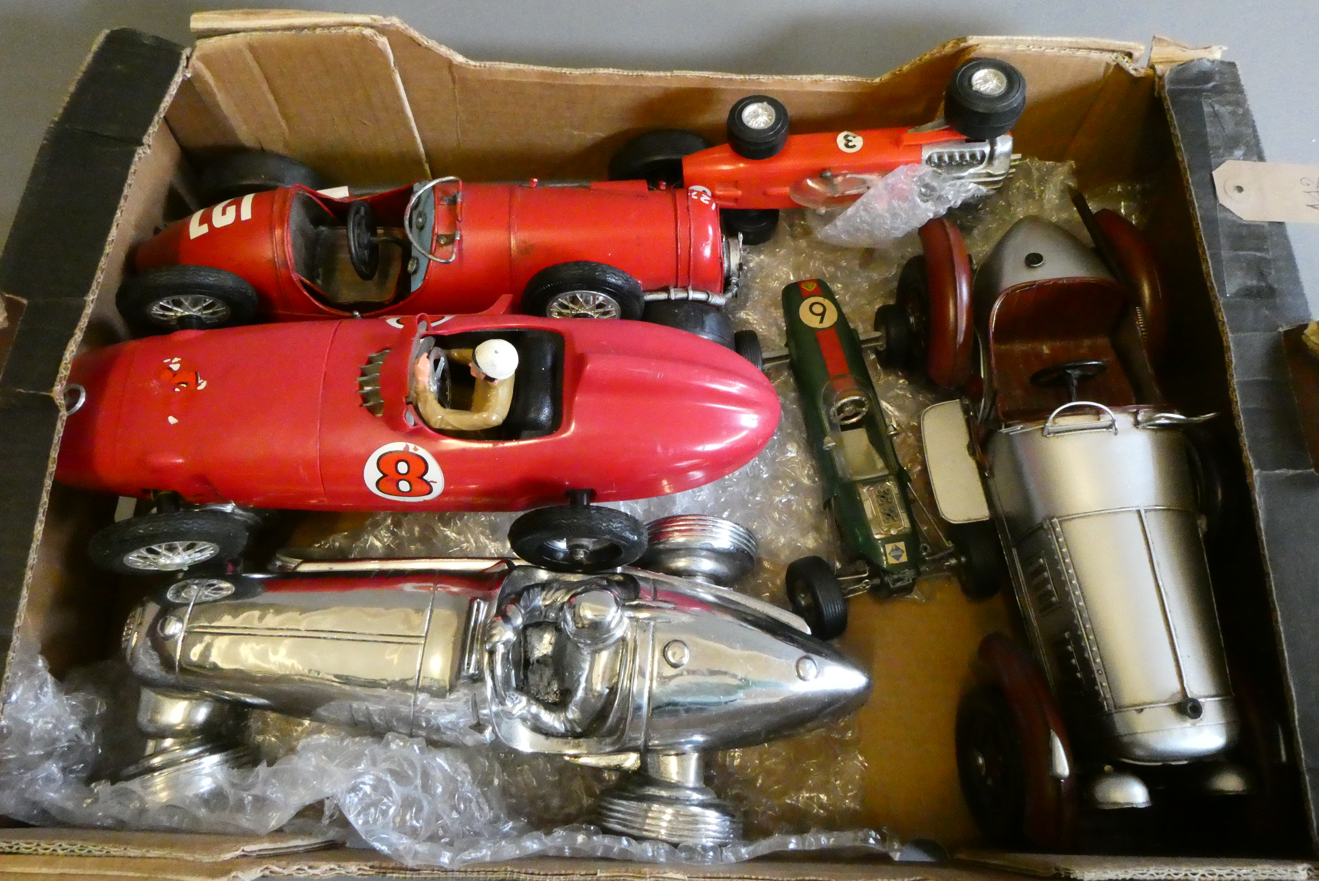 Six plastic and metal toy racing cars from 1950's and 60s, from various makers from Hong Kong and Image