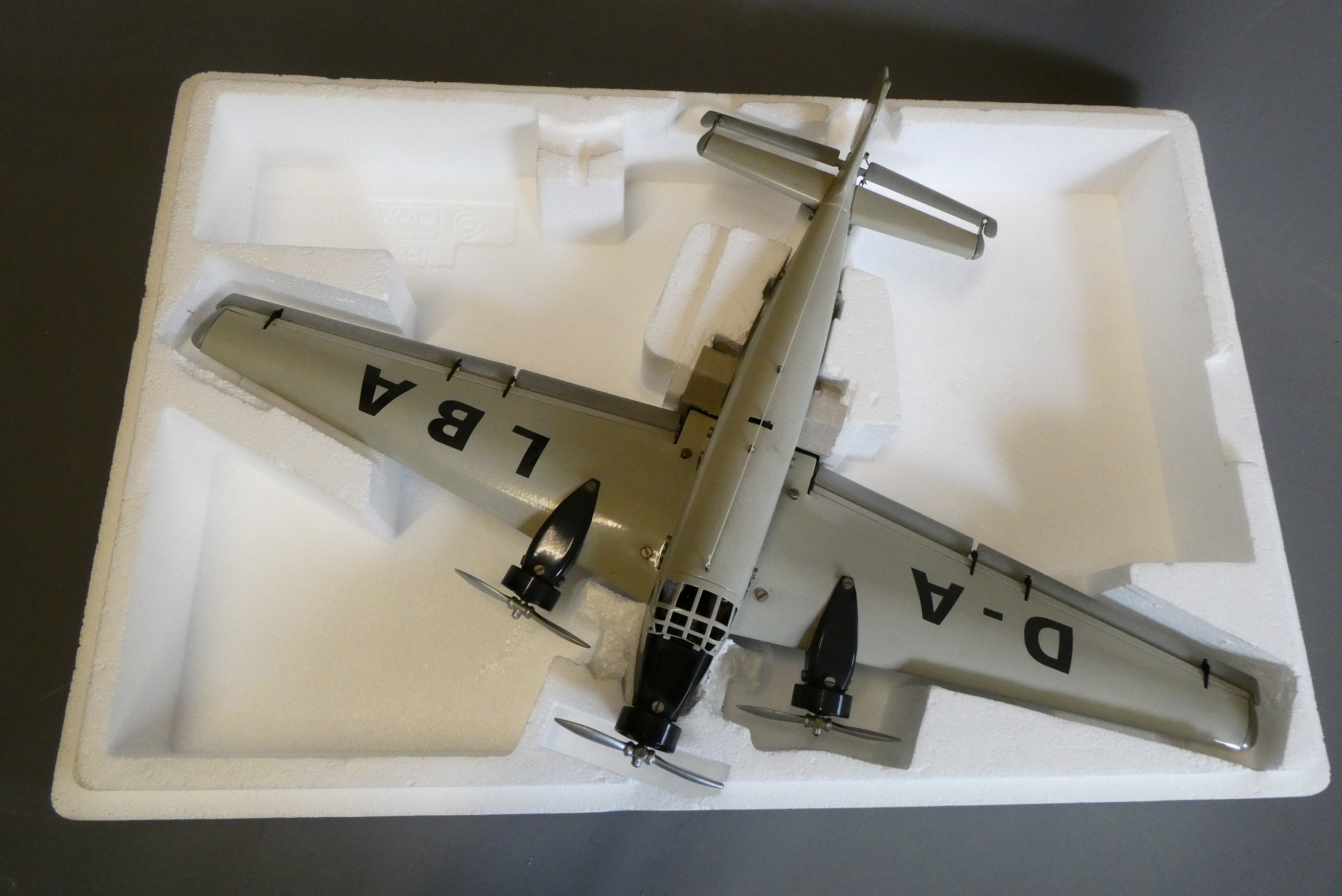 Late issues Marklin clockwork JU52 passenger plane, boxed, good to excellent (Est. plus 24% premium Image