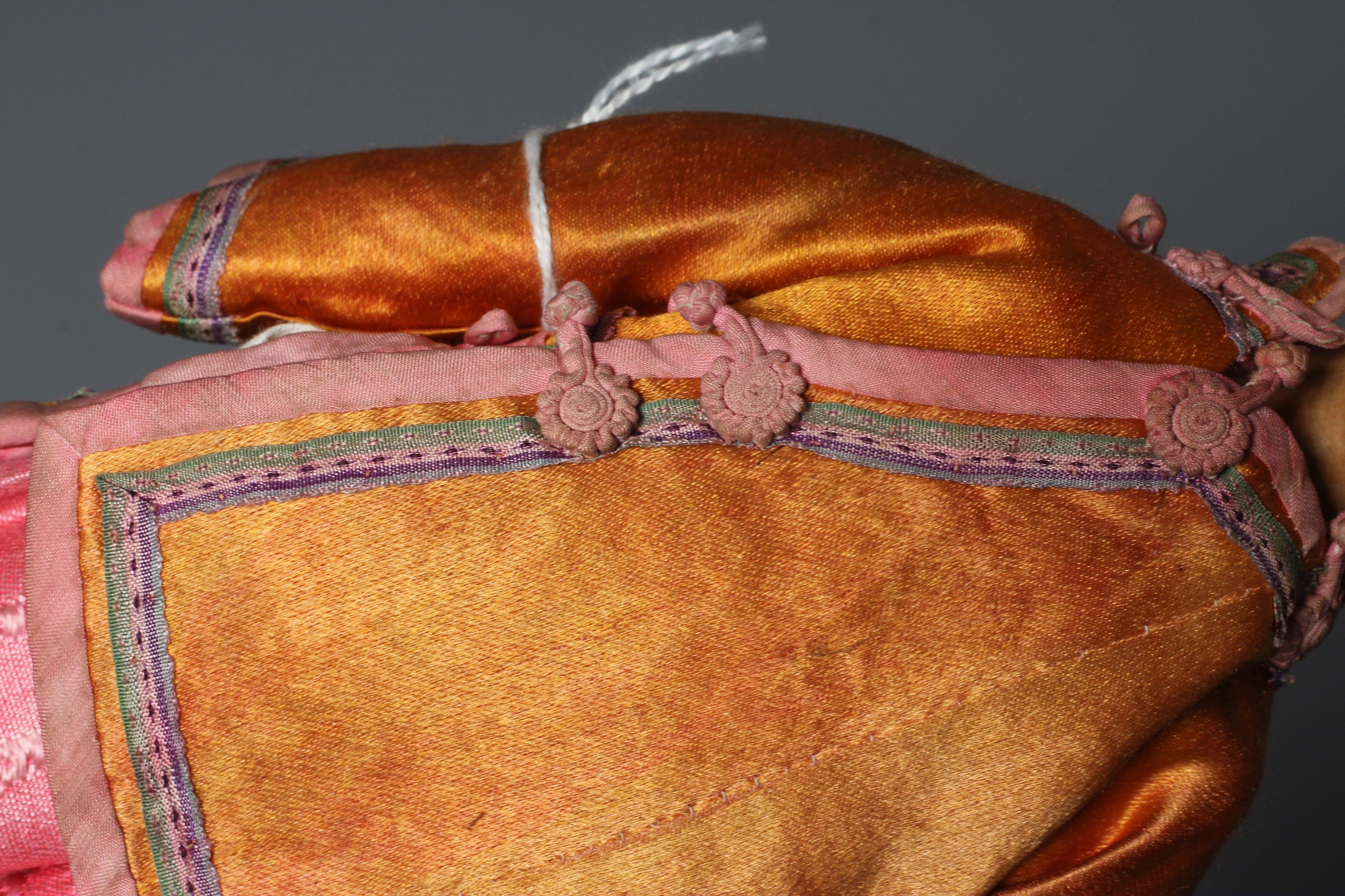 A Door of Hope male doll, with carved wood head, fabric body and original silk dress, 9 3/4" (Est. Image