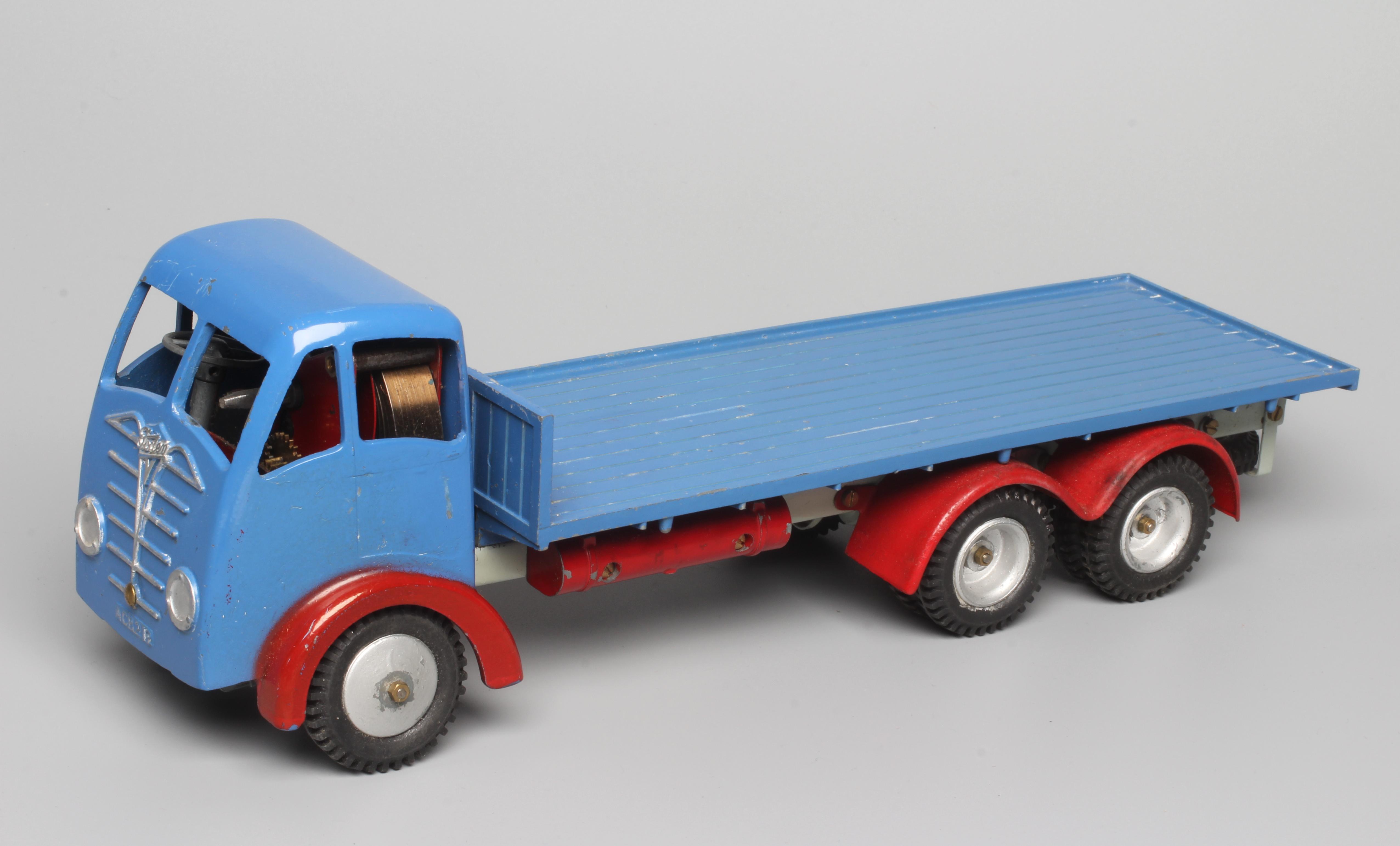 Shackleton clockwork Flatbed lorry finished in blue with key and spanners. Clockwork motor tested ok Image