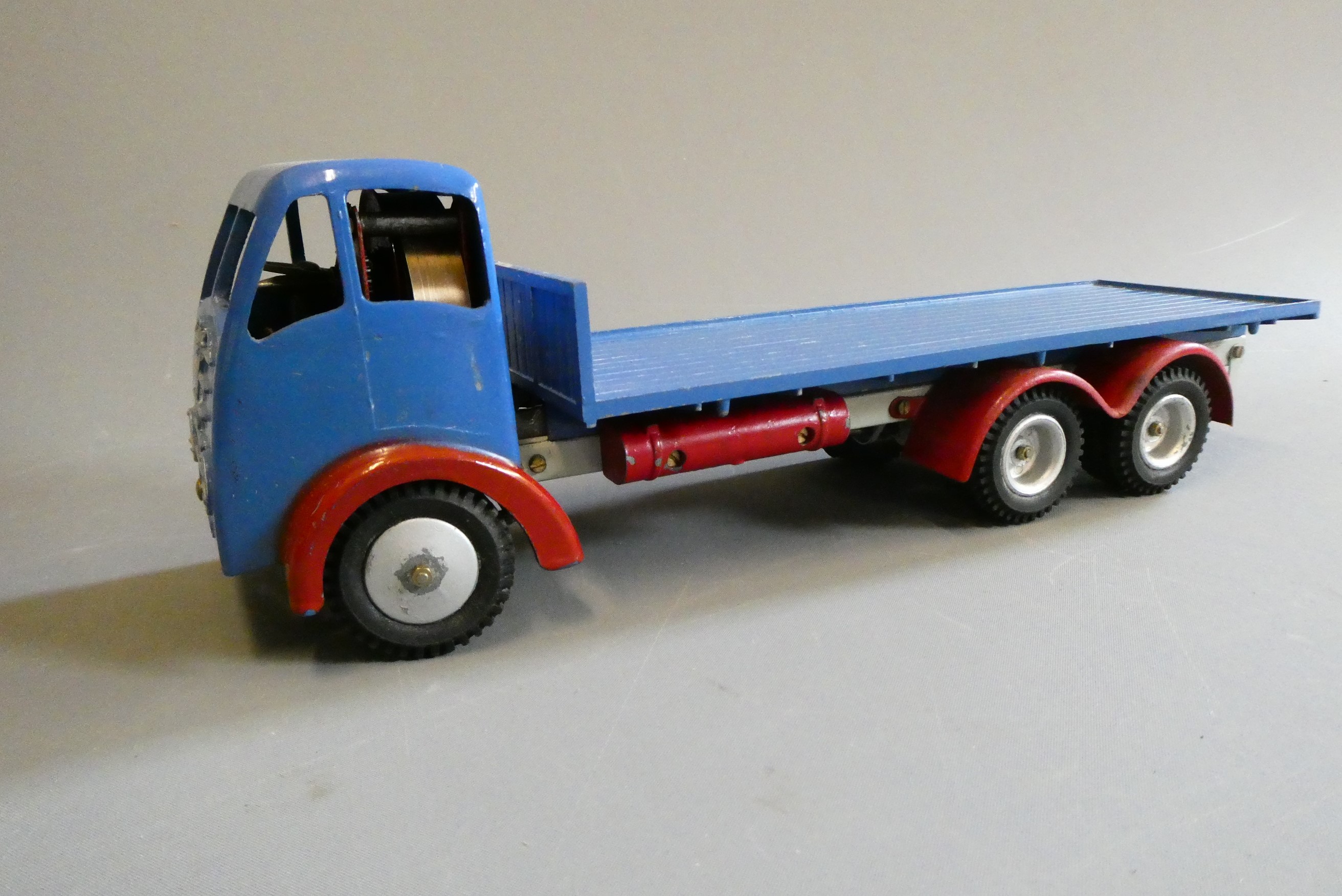 Shackleton clockwork Flatbed lorry finished in blue with key and spanners. Clockwork motor tested ok Image