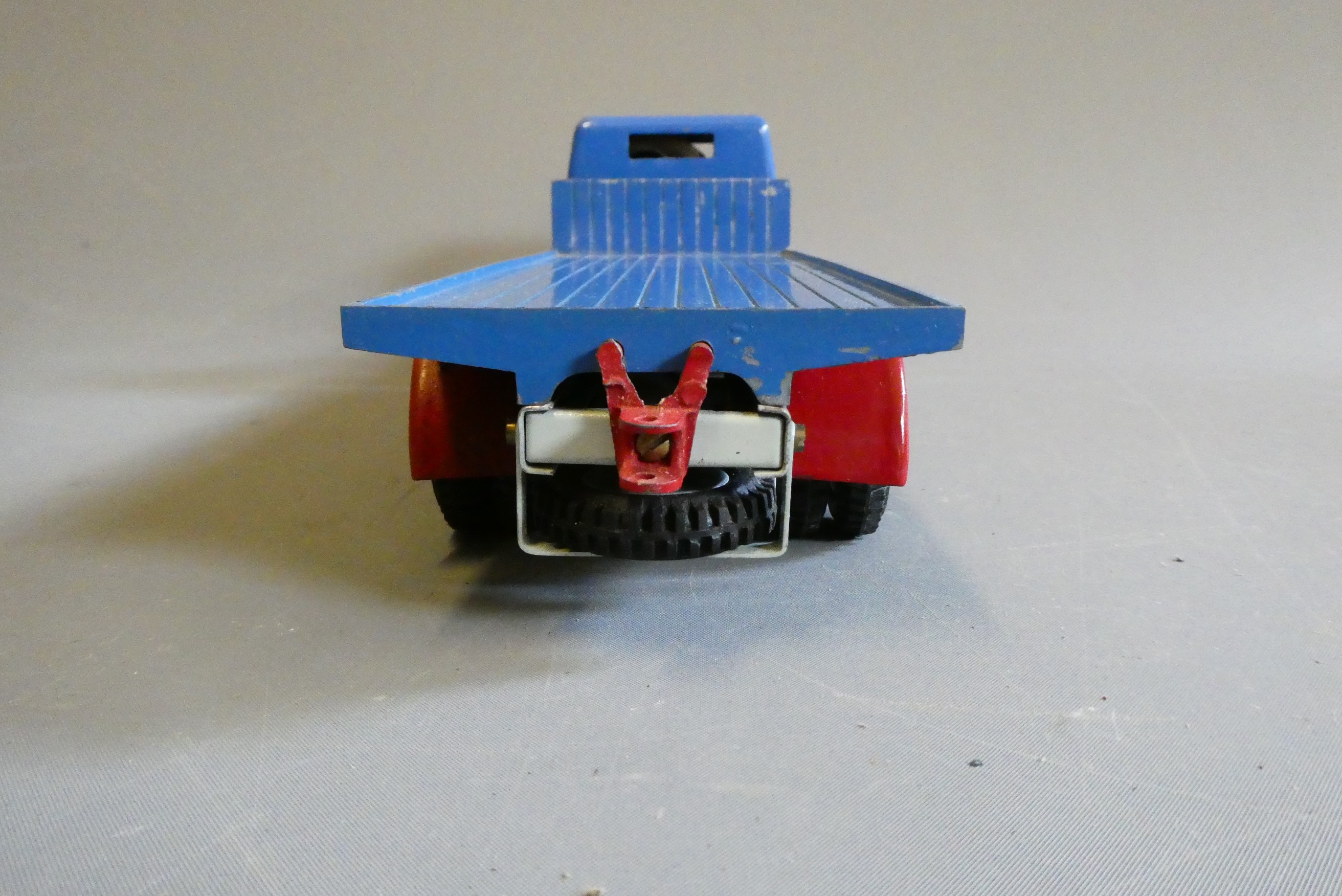 Shackleton clockwork Flatbed lorry finished in blue with key and spanners. Clockwork motor tested ok Image