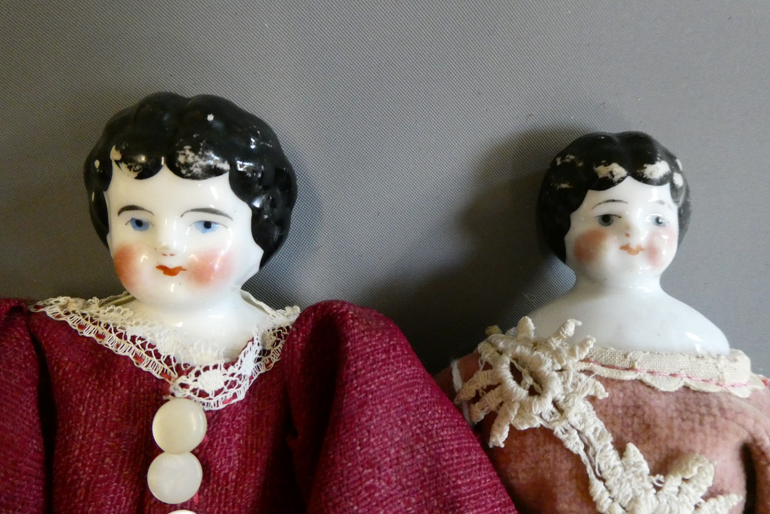 Three china head doll's house dolls Image