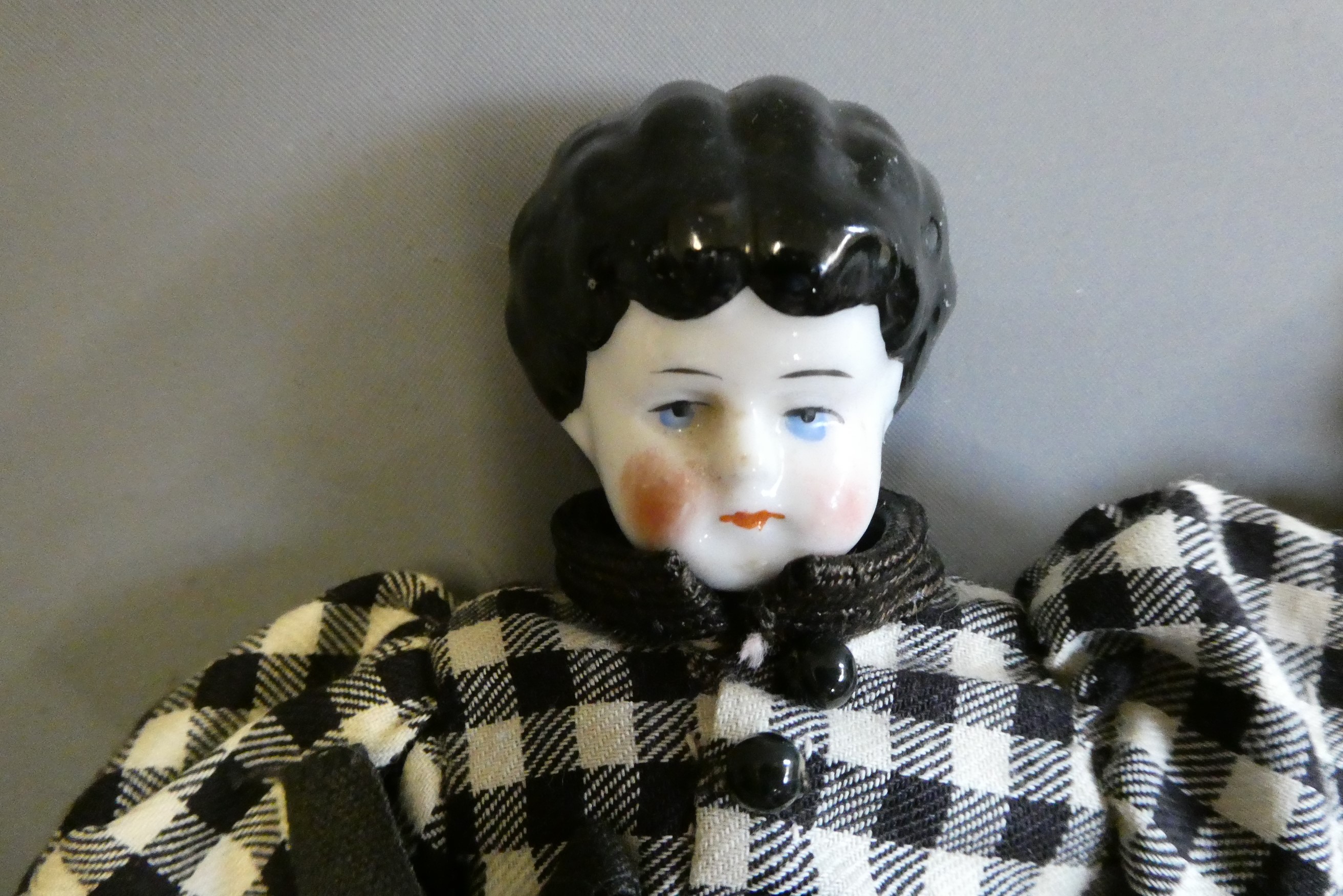 Three china head doll's house dolls Image