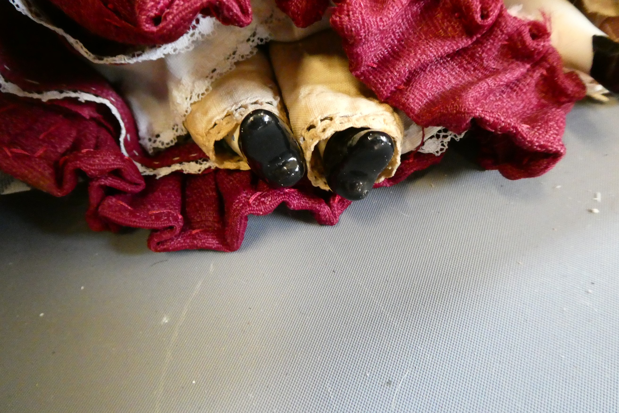 Three china head doll's house dolls Image