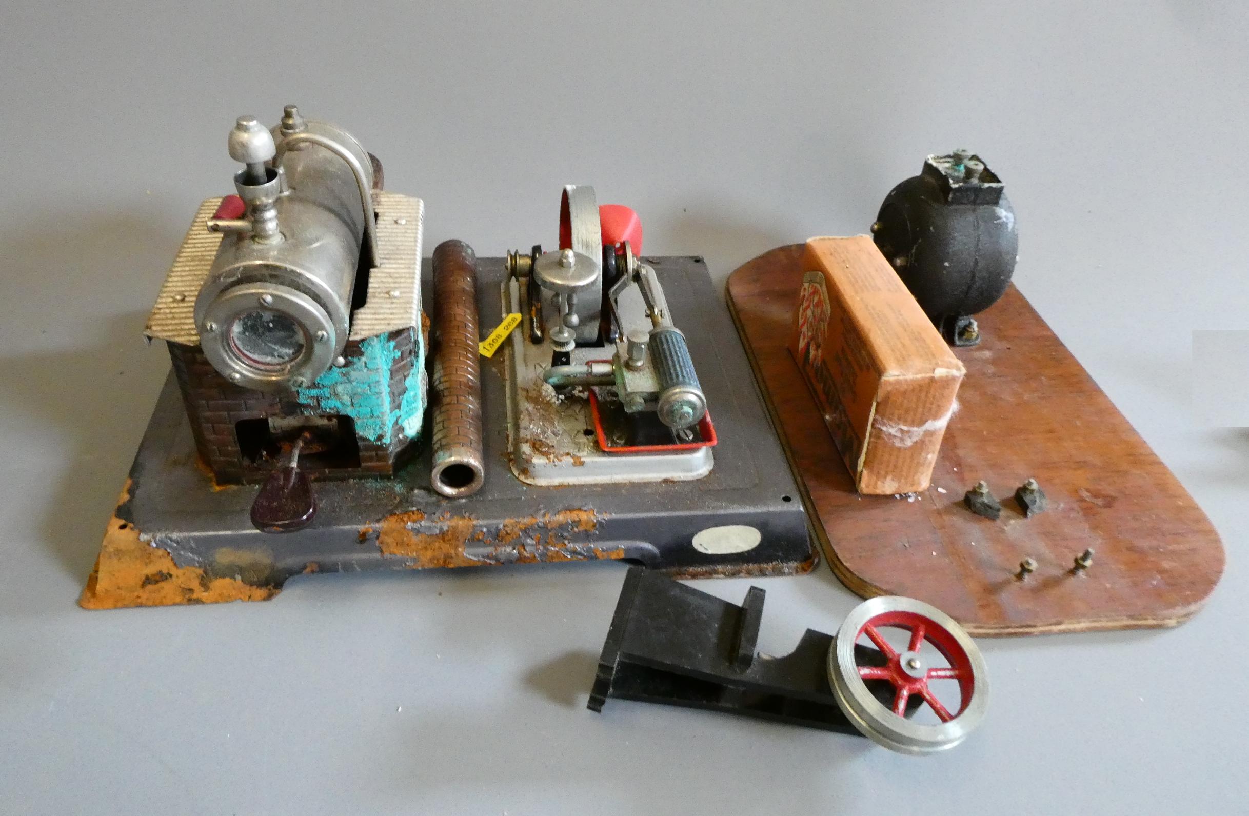 Playworn Wilesco stationary steam engine with model press tool and Meccano electric motor. Some Image