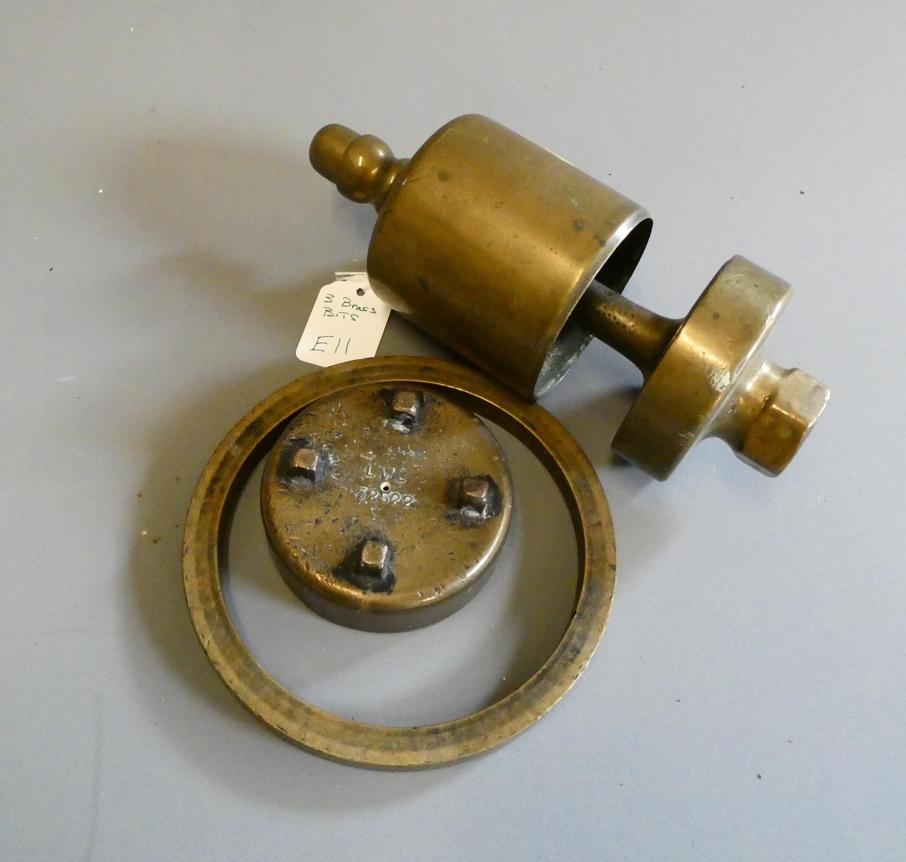 A brass train whistle, marked L.M Ltd., and a small number of tools/parts (Est. plus 24% premium Image