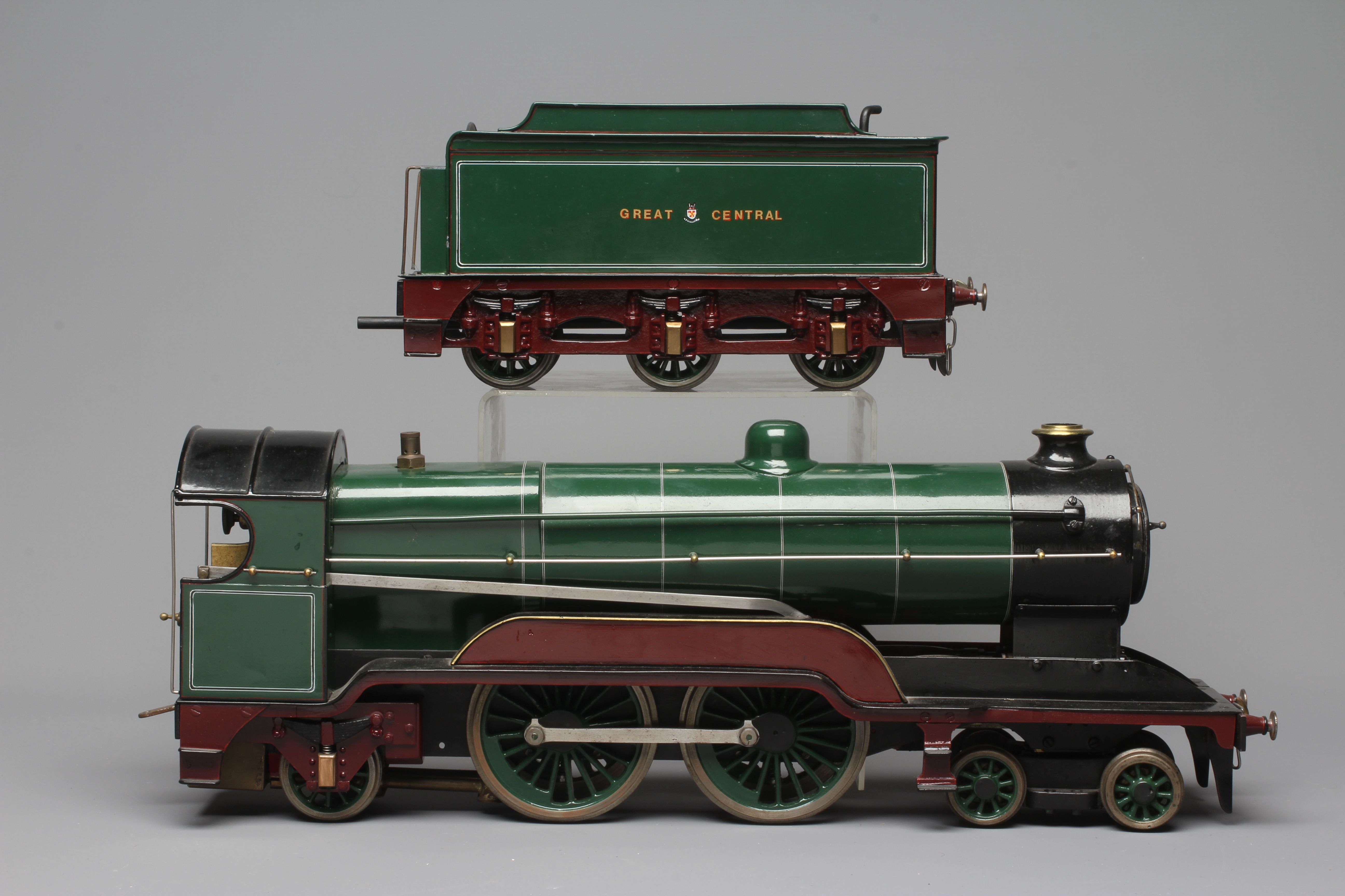 A 2 1/2" gauge Atlantic 4-4-2 live steam locomotive finished in GCR green. Two inside cylinders with Image