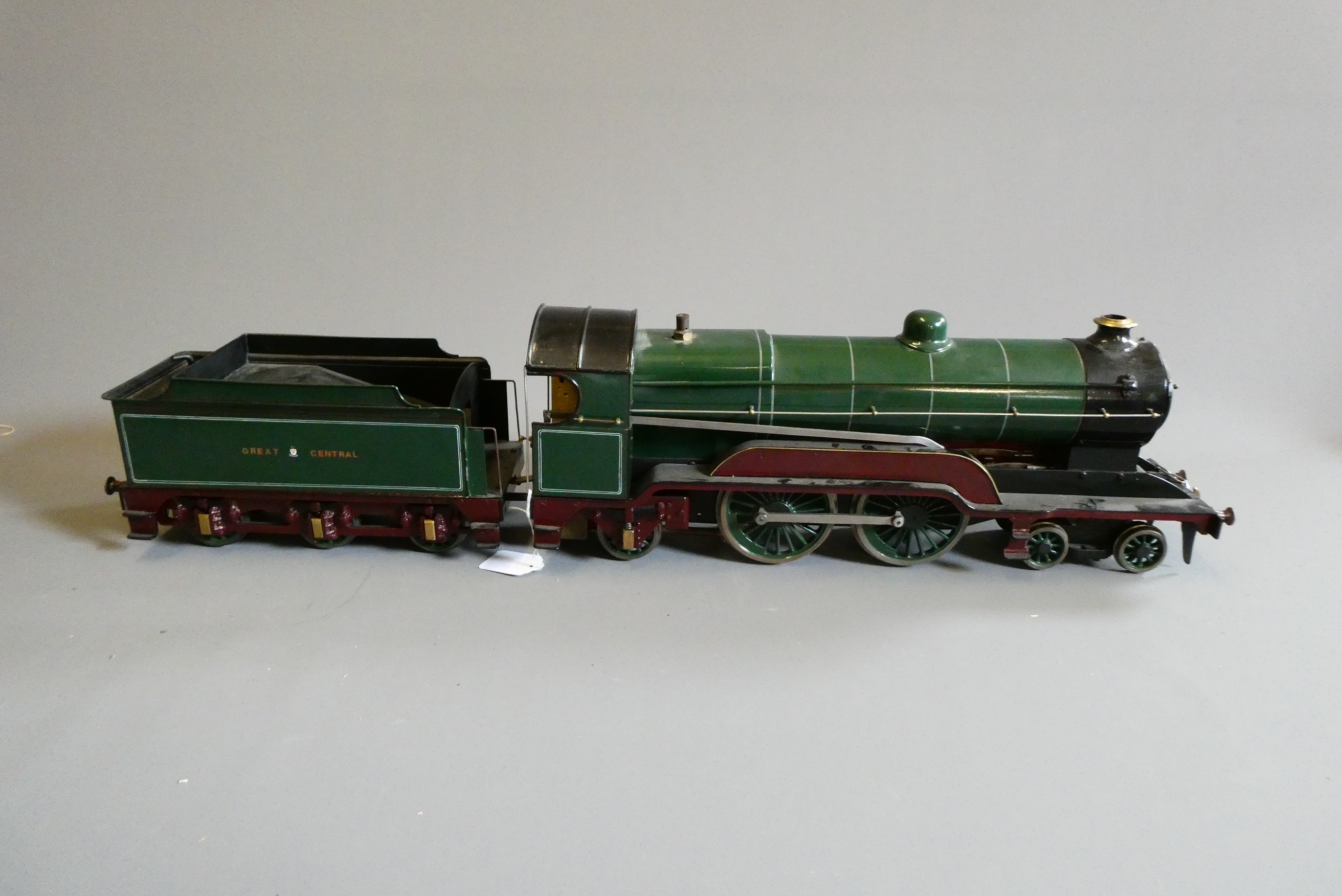 A 2 1/2" gauge Atlantic 4-4-2 live steam locomotive finished in GCR green. Two inside cylinders with Image