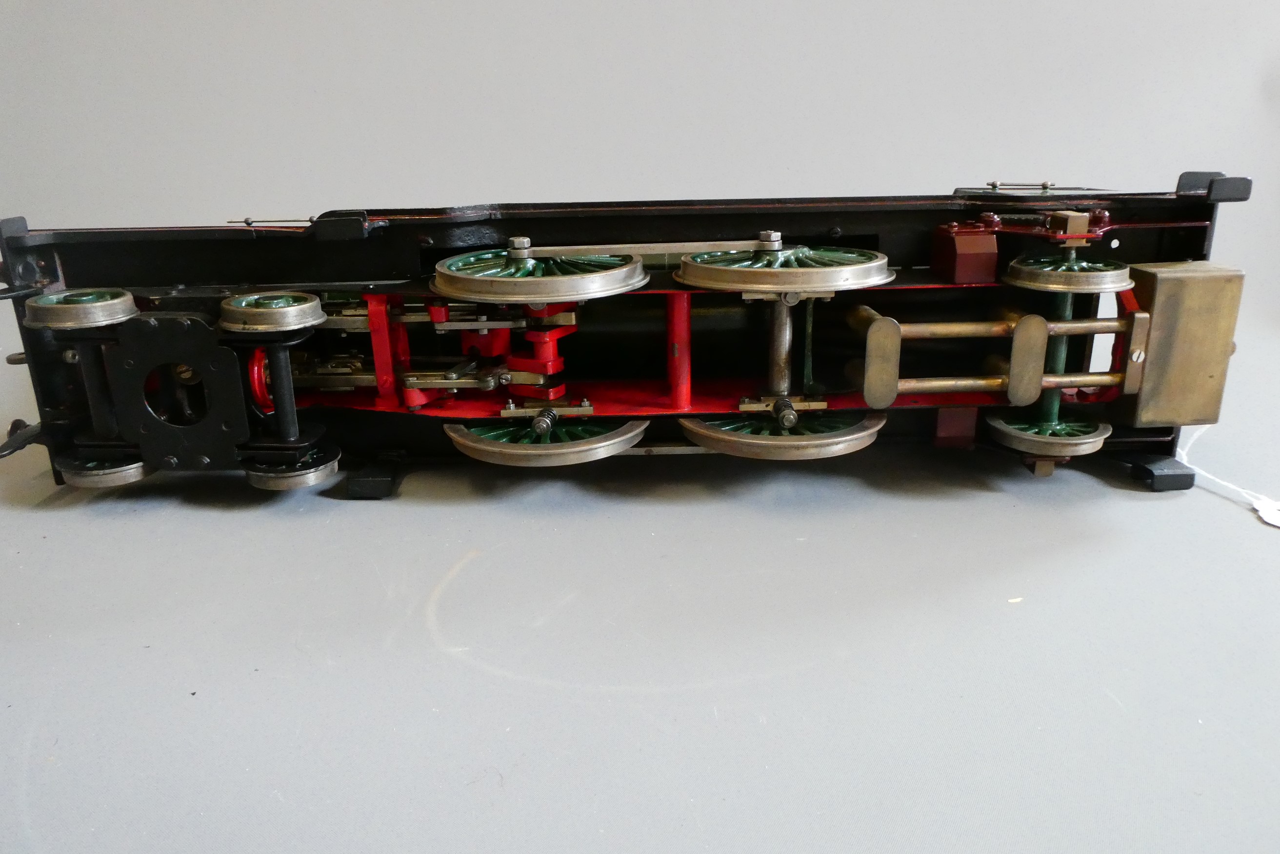 A 2 1/2" gauge Atlantic 4-4-2 live steam locomotive finished in GCR green. Two inside cylinders with Image