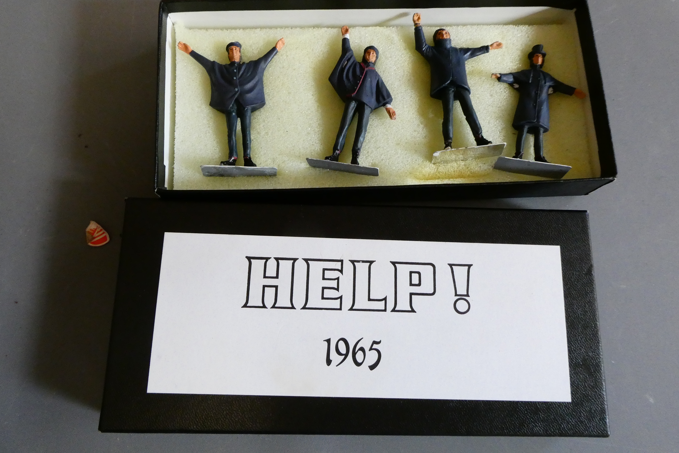 Four cast 65mm figures of the Beatles, 1965, from the film HELP! Boxed, good (Est. plus 24% premium Image
