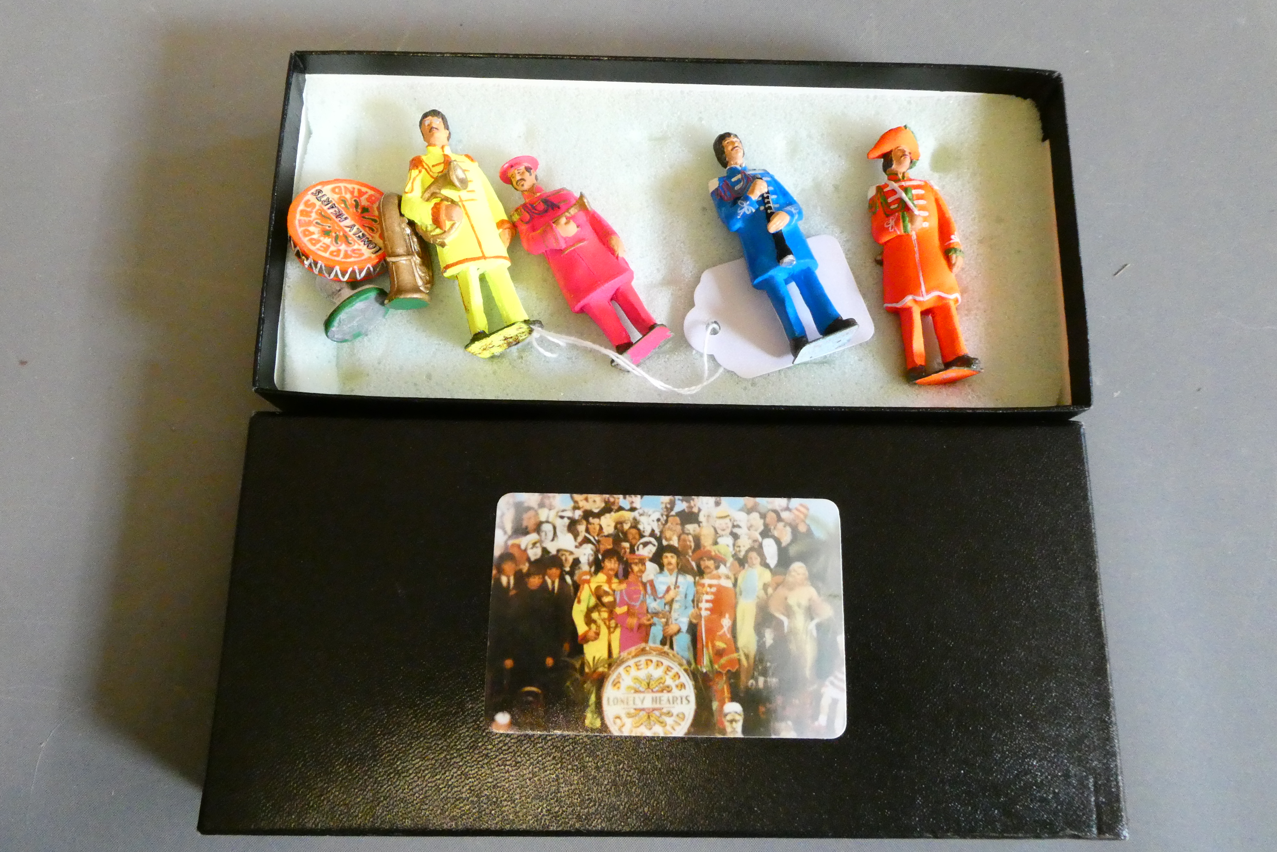 Four cast 65mm figures from the Sergeant Pepper album cover. Boxed, good (Est. plus 24% premium inc. Image