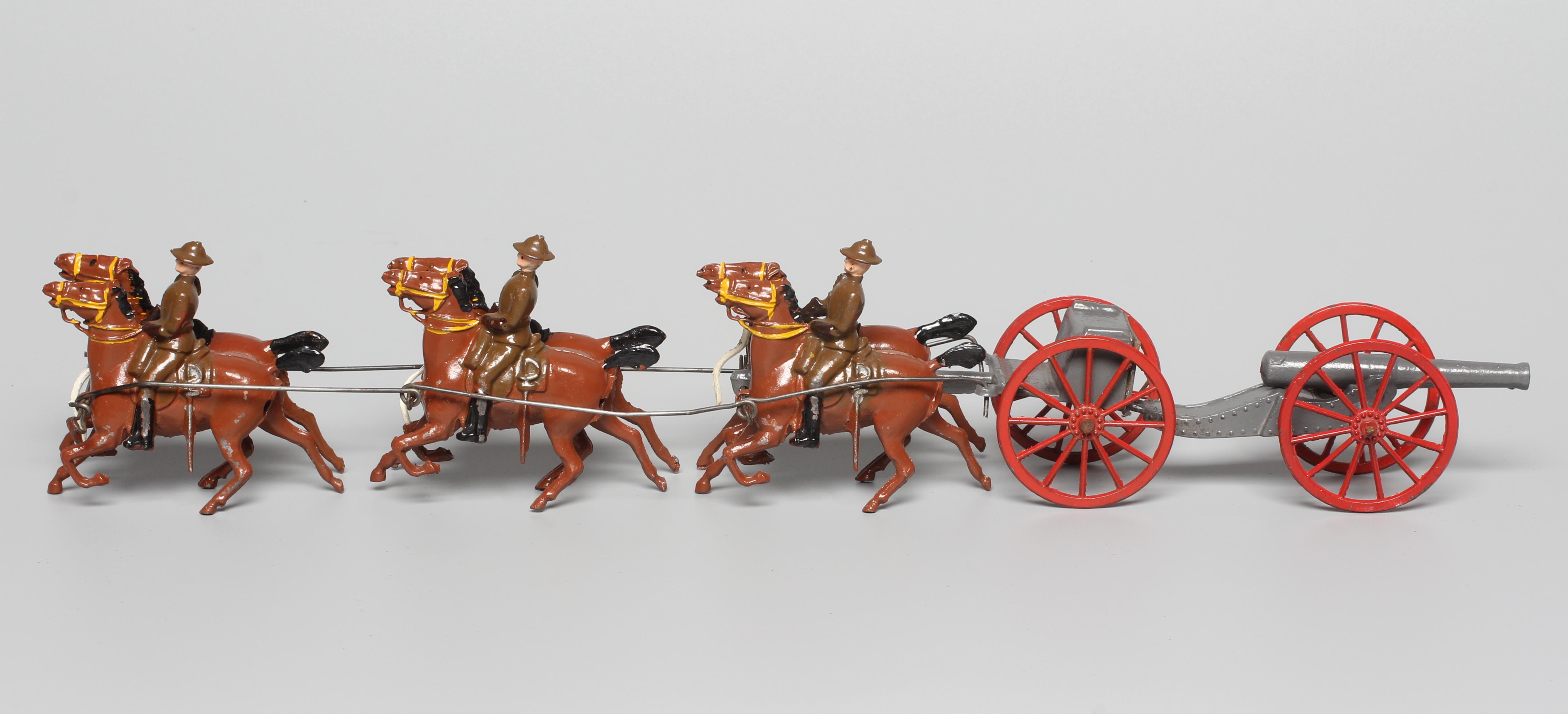 Rare Crescent Toys horse drawn artillery gun with field gun, limber, six horses and 3 riders. Image