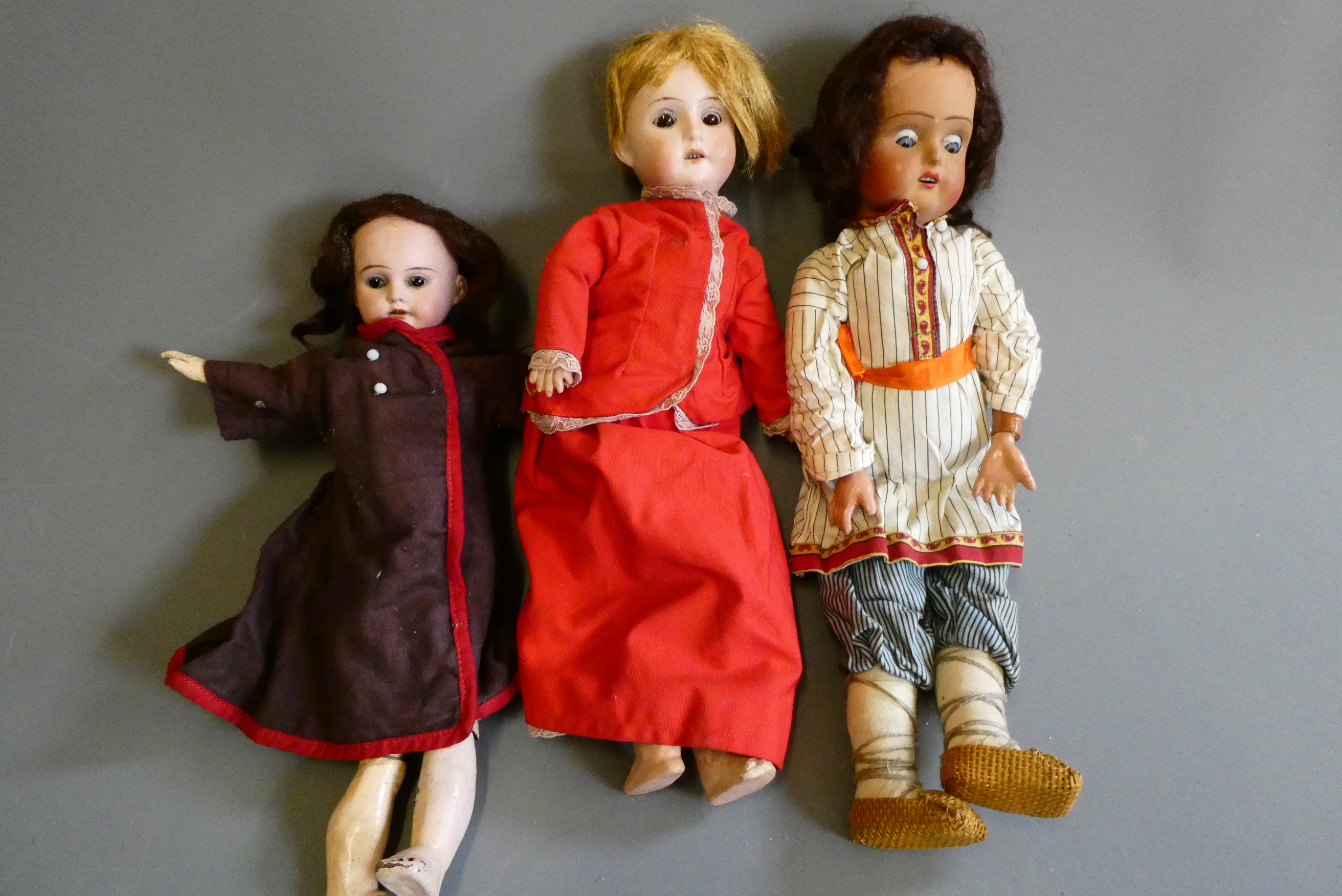 Three bisque socket head dolls Image