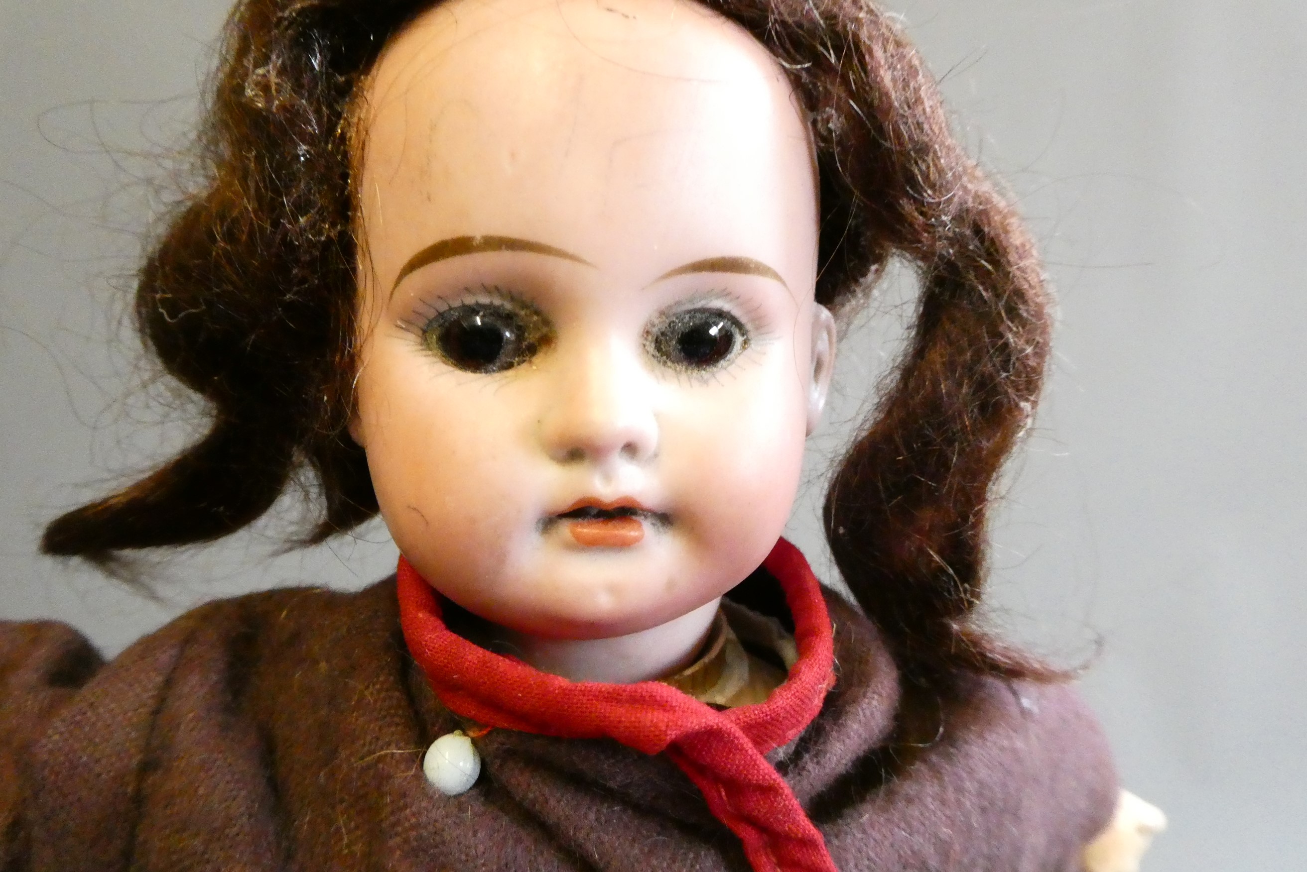 Three bisque socket head dolls Image
