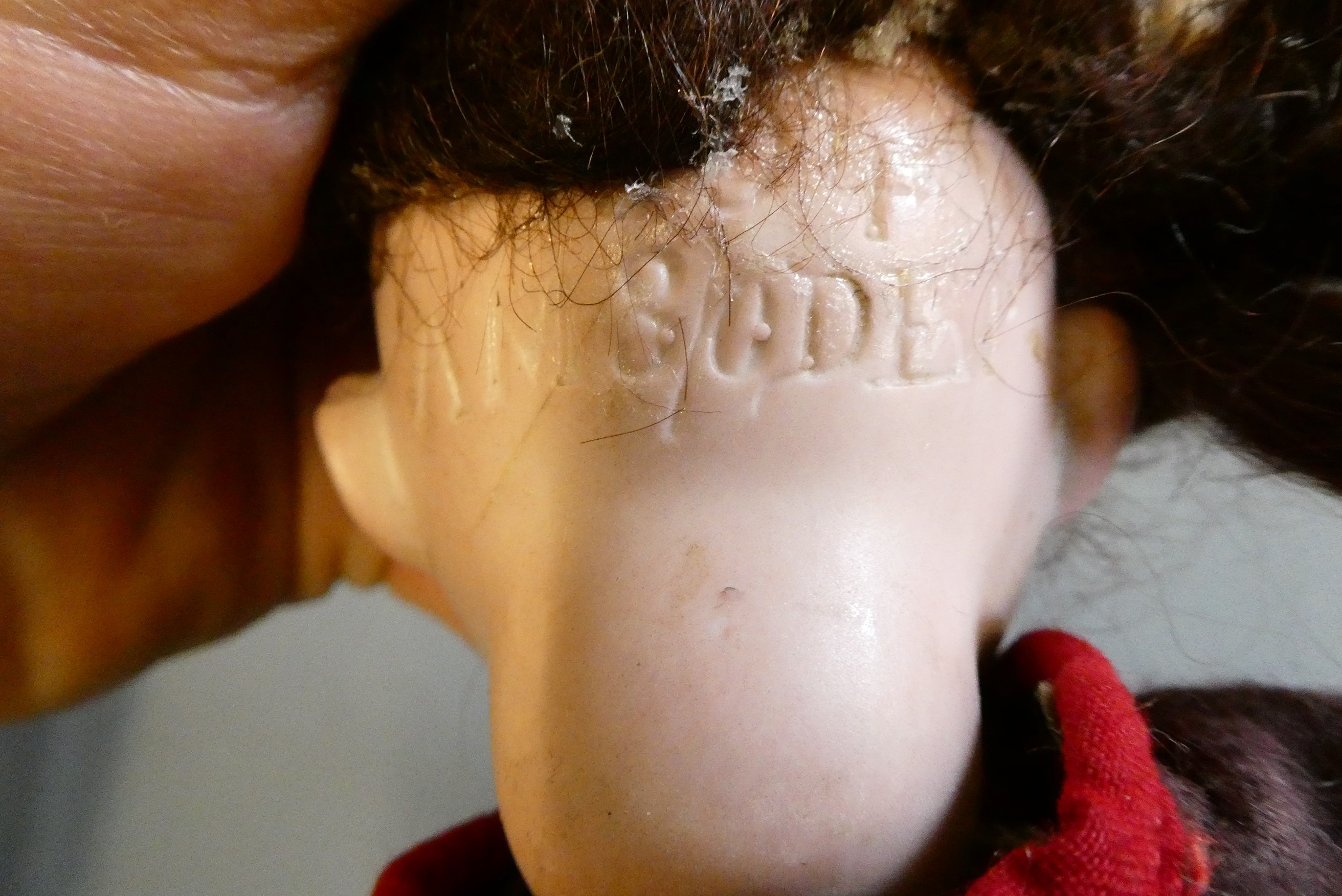 Three bisque socket head dolls Image