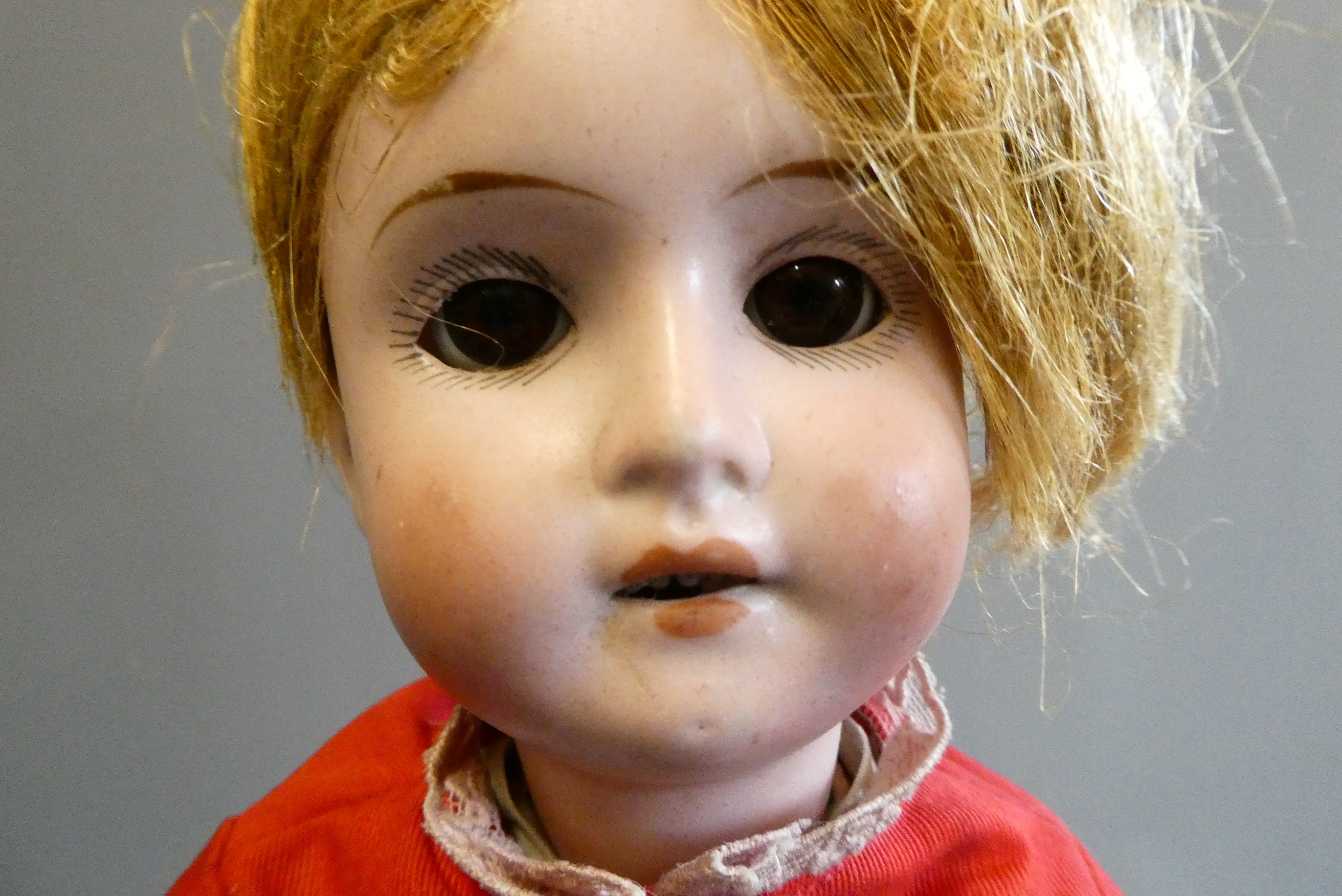 Three bisque socket head dolls Image