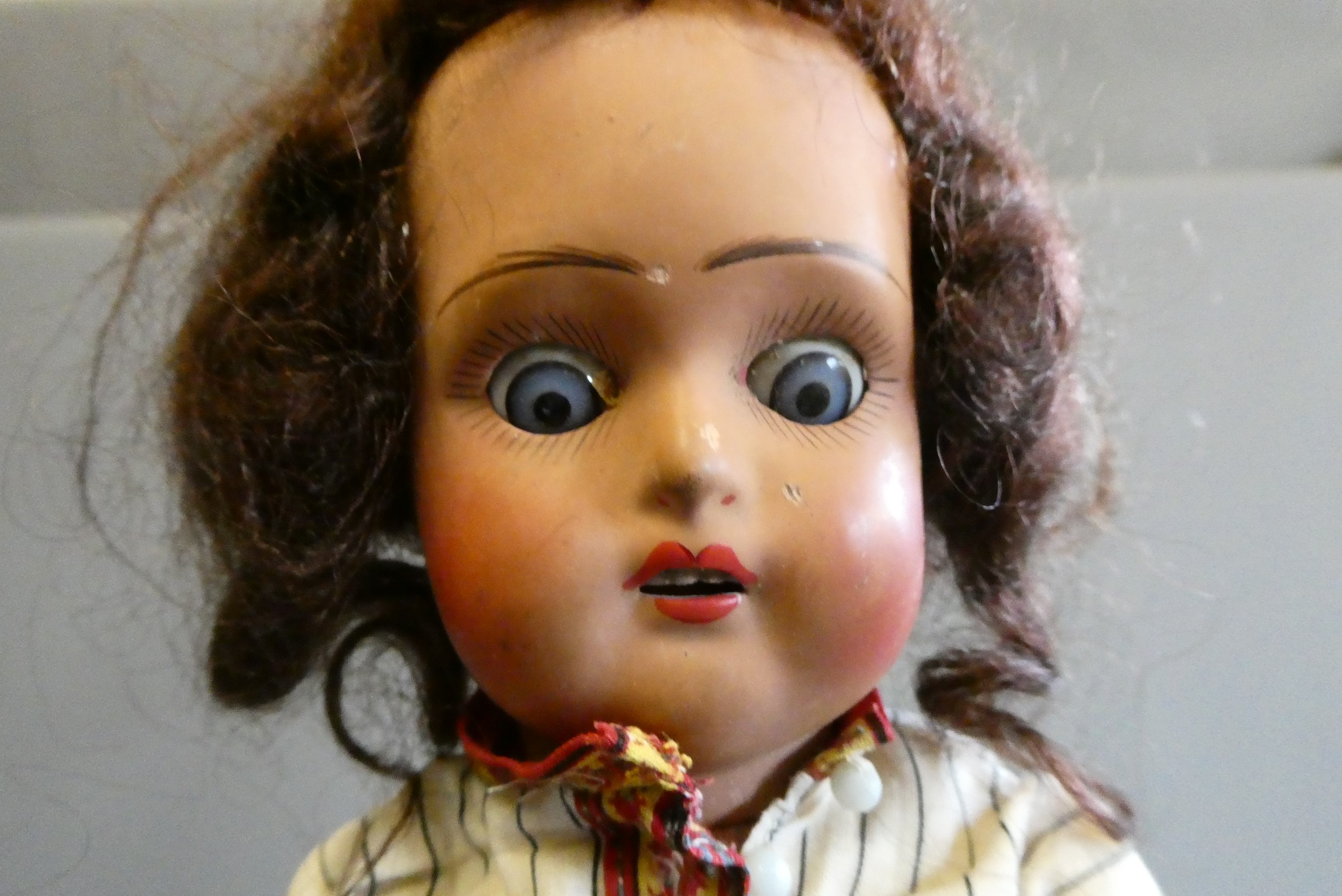 Three bisque socket head dolls Image