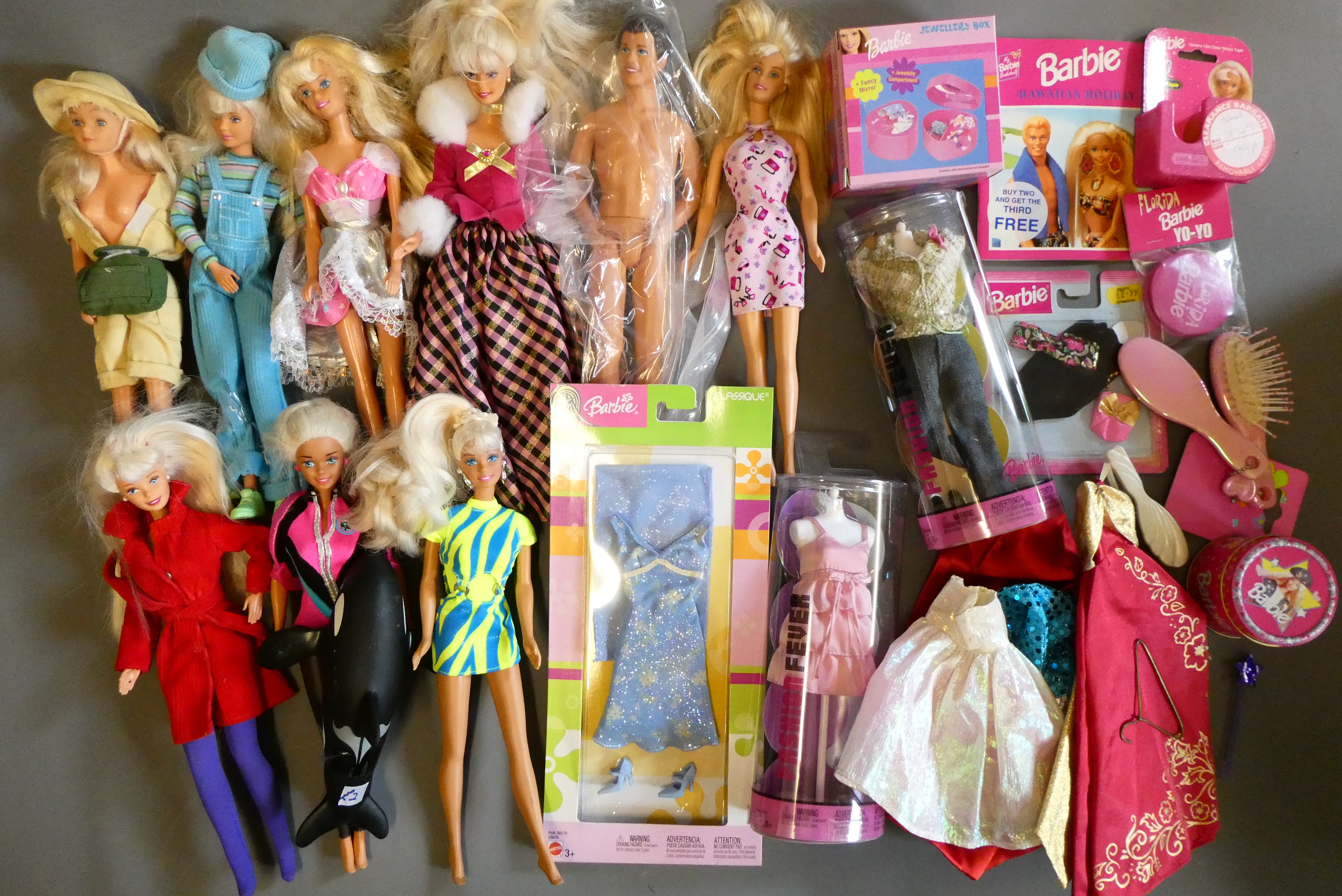 Eight dolls, comprising six Barbie dolls, one ken doll and two similar, together with an assortment Image