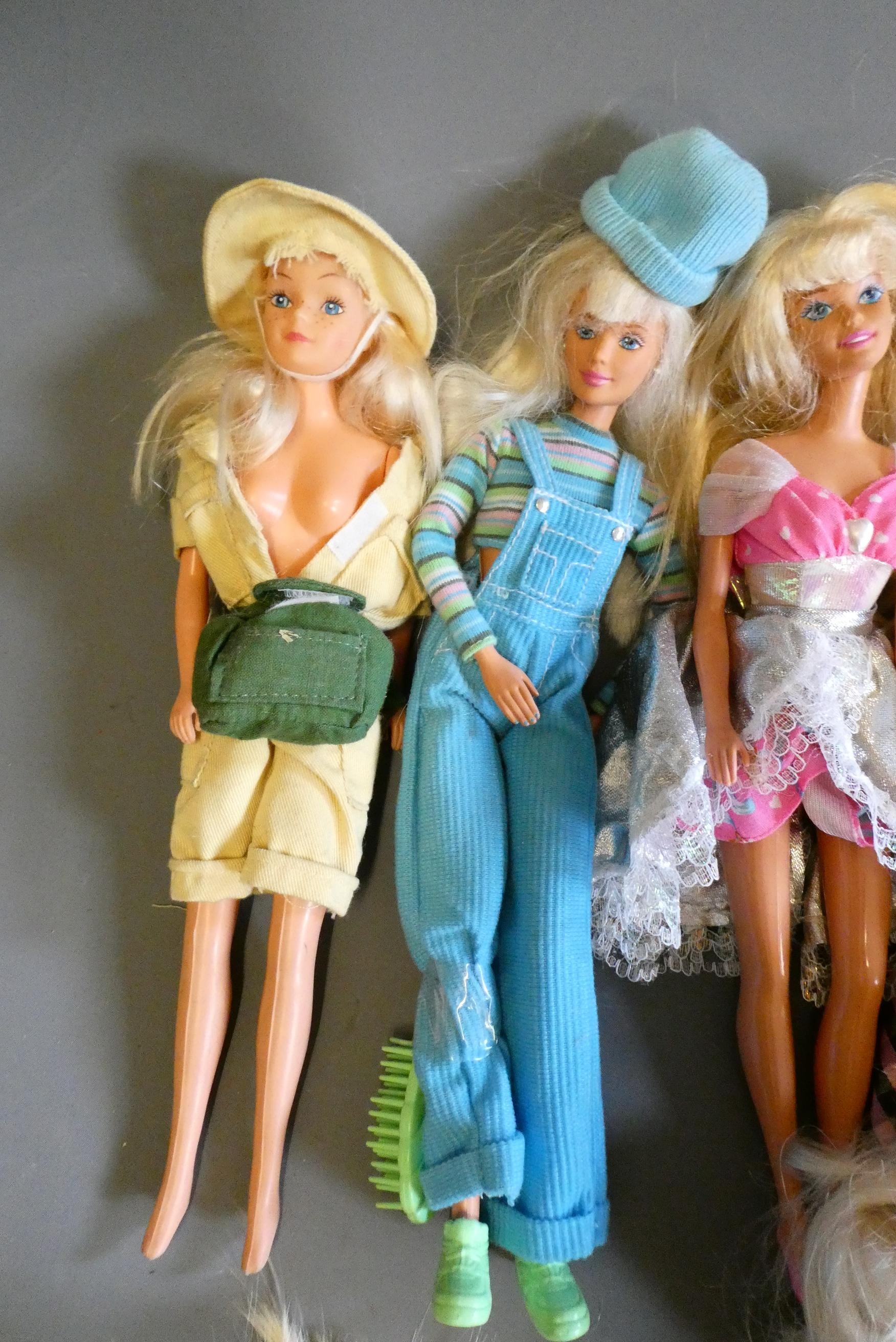 Eight dolls, comprising six Barbie dolls, one ken doll and two similar, together with an assortment Image