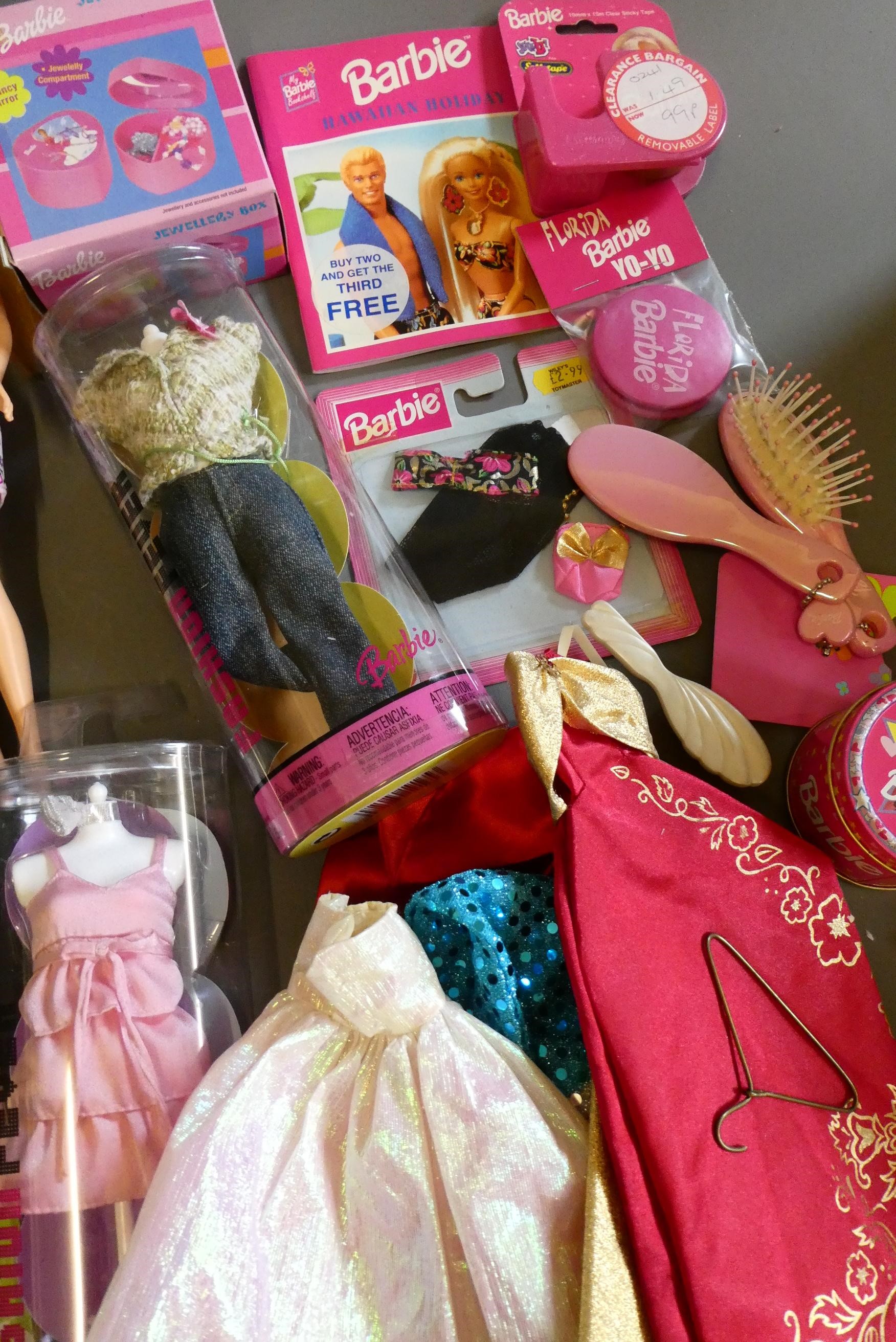 Eight dolls, comprising six Barbie dolls, one ken doll and two similar, together with an assortment Image