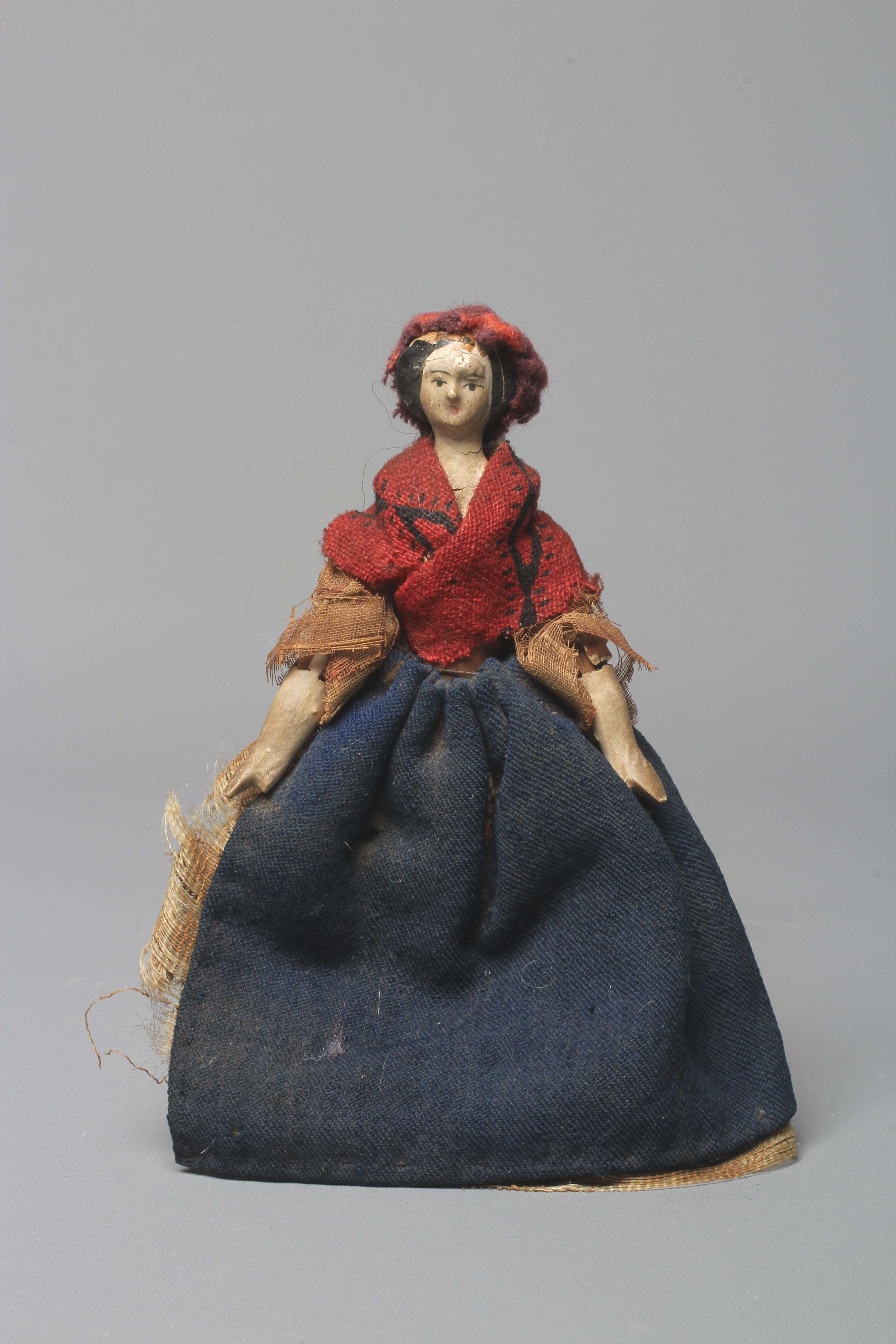 A Victorian Grod doll's house doll, with painted composition head, shaped wood body and carved Image
