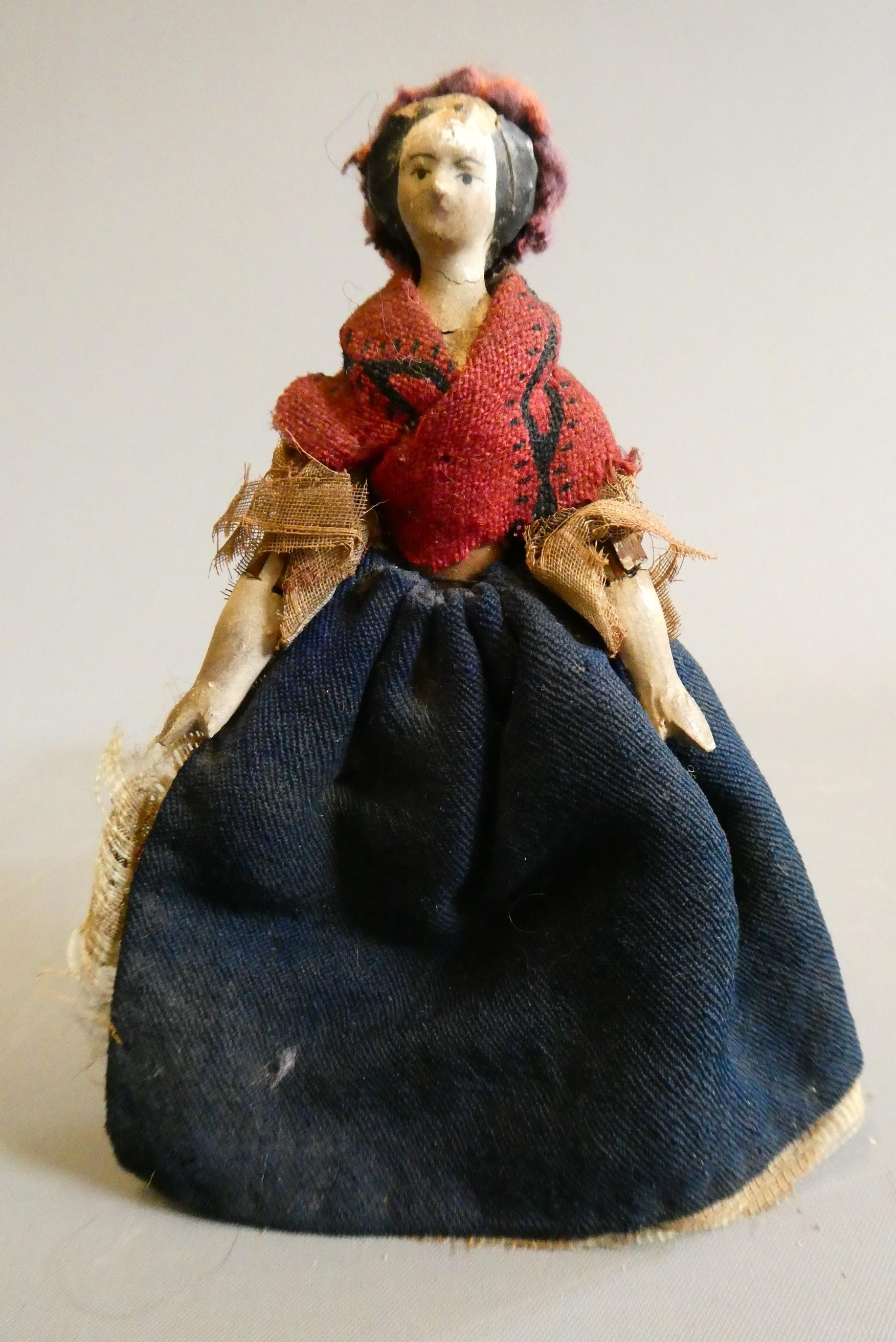 A Victorian Grod doll's house doll, with painted composition head, shaped wood body and carved Image