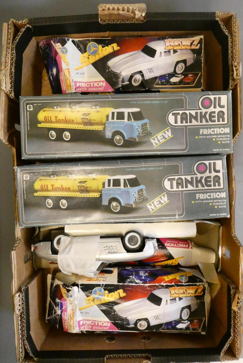 Five late issue tinplate friction power vehicles comprising three Mercedes SL300 and two oil Image