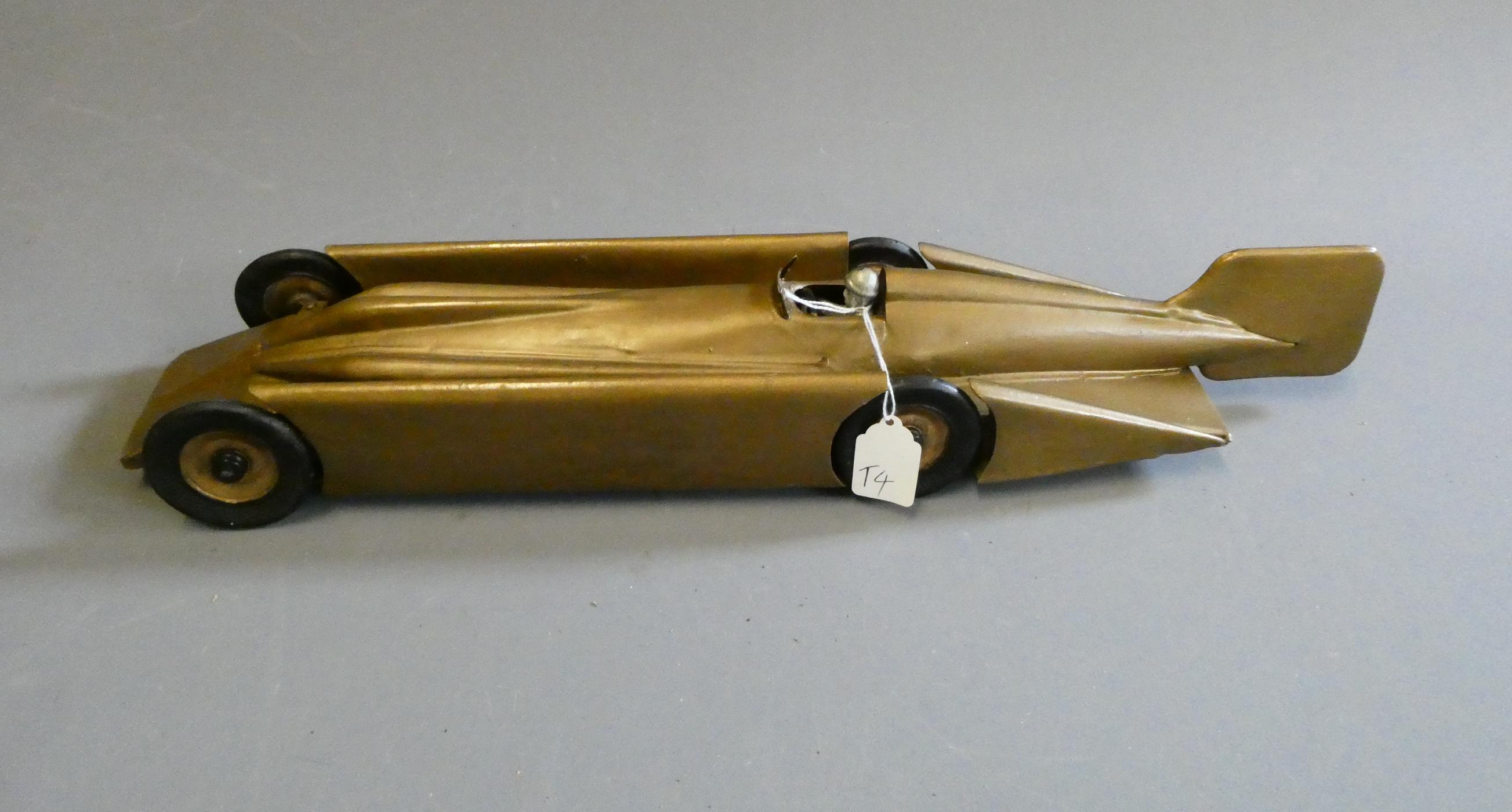 Kingsbury clockwork Golden Arrow speed record car, overpainting and repairs, loose parts, fair to Image