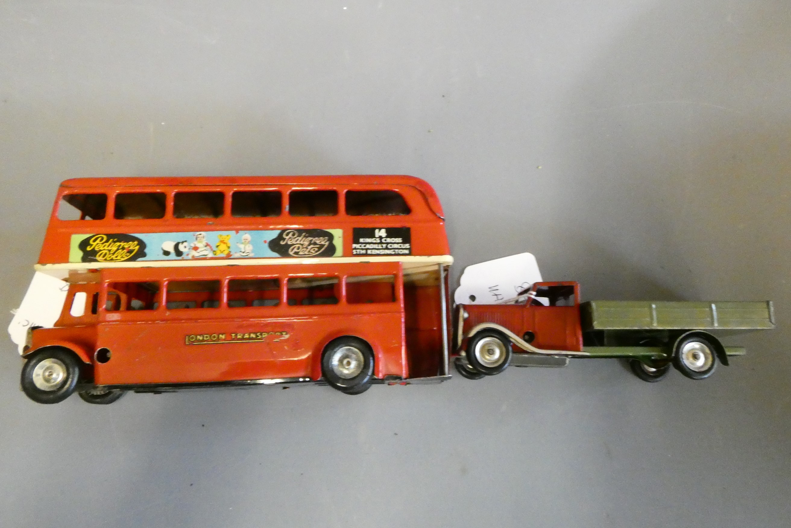 Minic friction powered London bus and clockwork open truck, both models fair (Est. plus 24% premium Image