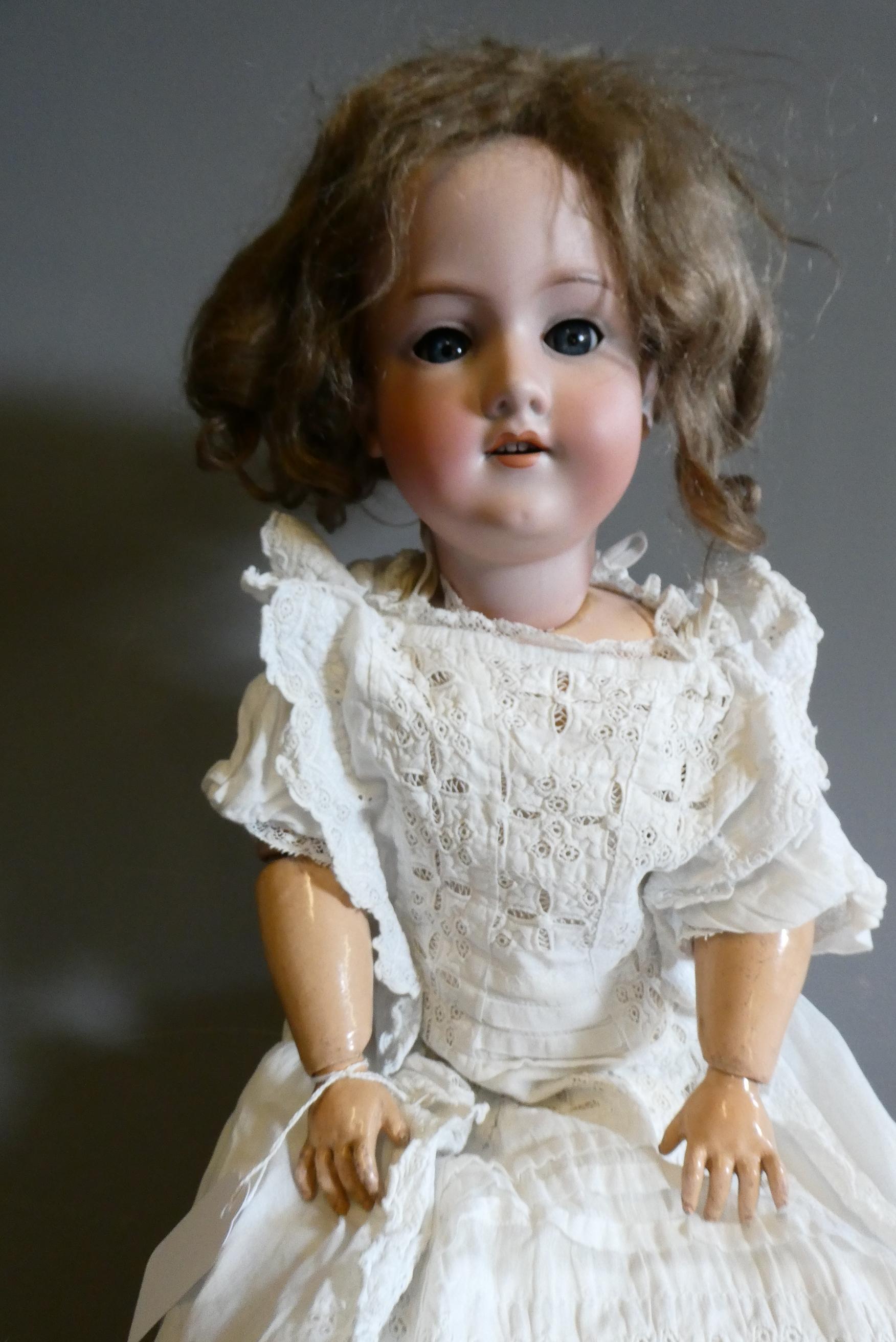 An Armand Marseille bisque socket head doll Image