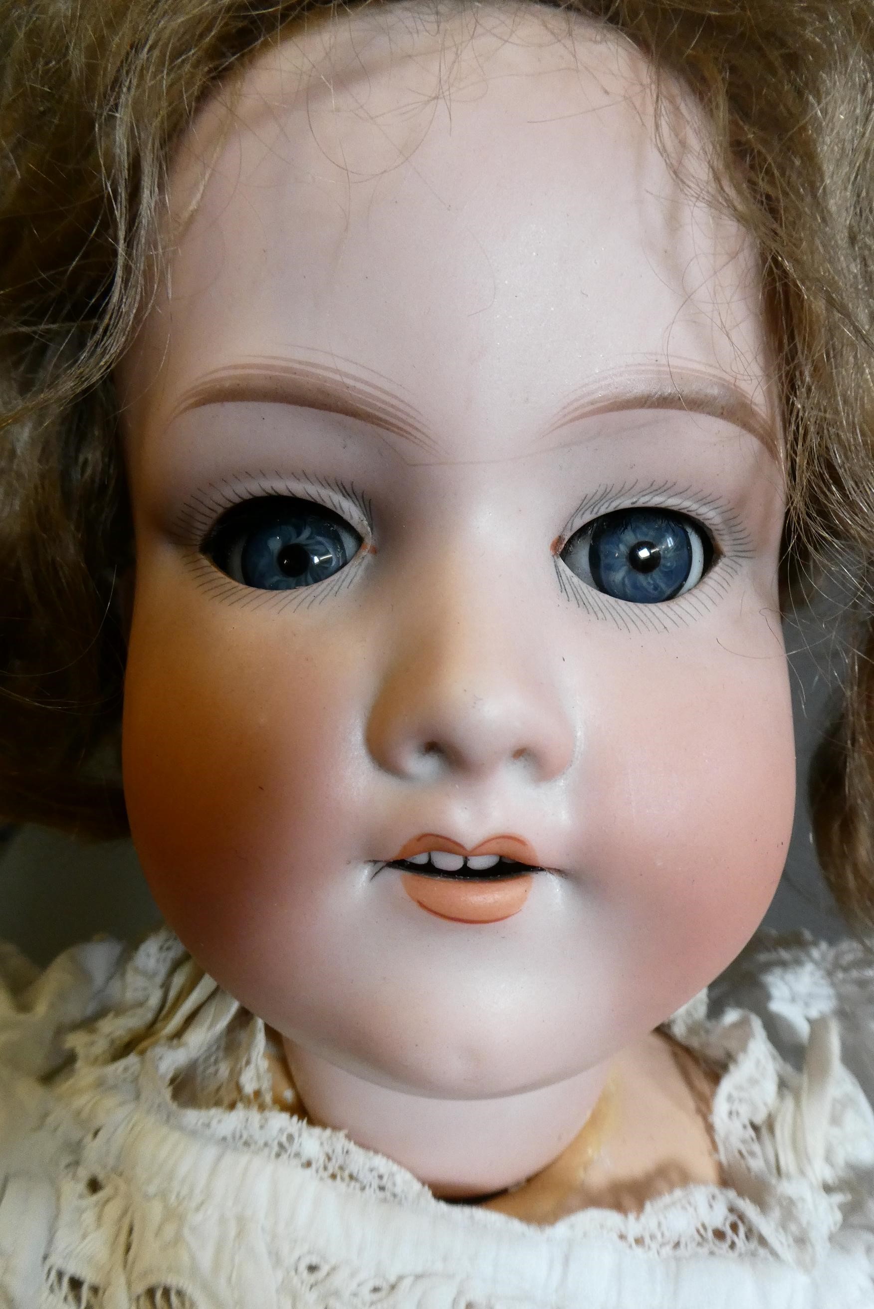 An Armand Marseille bisque socket head doll Image