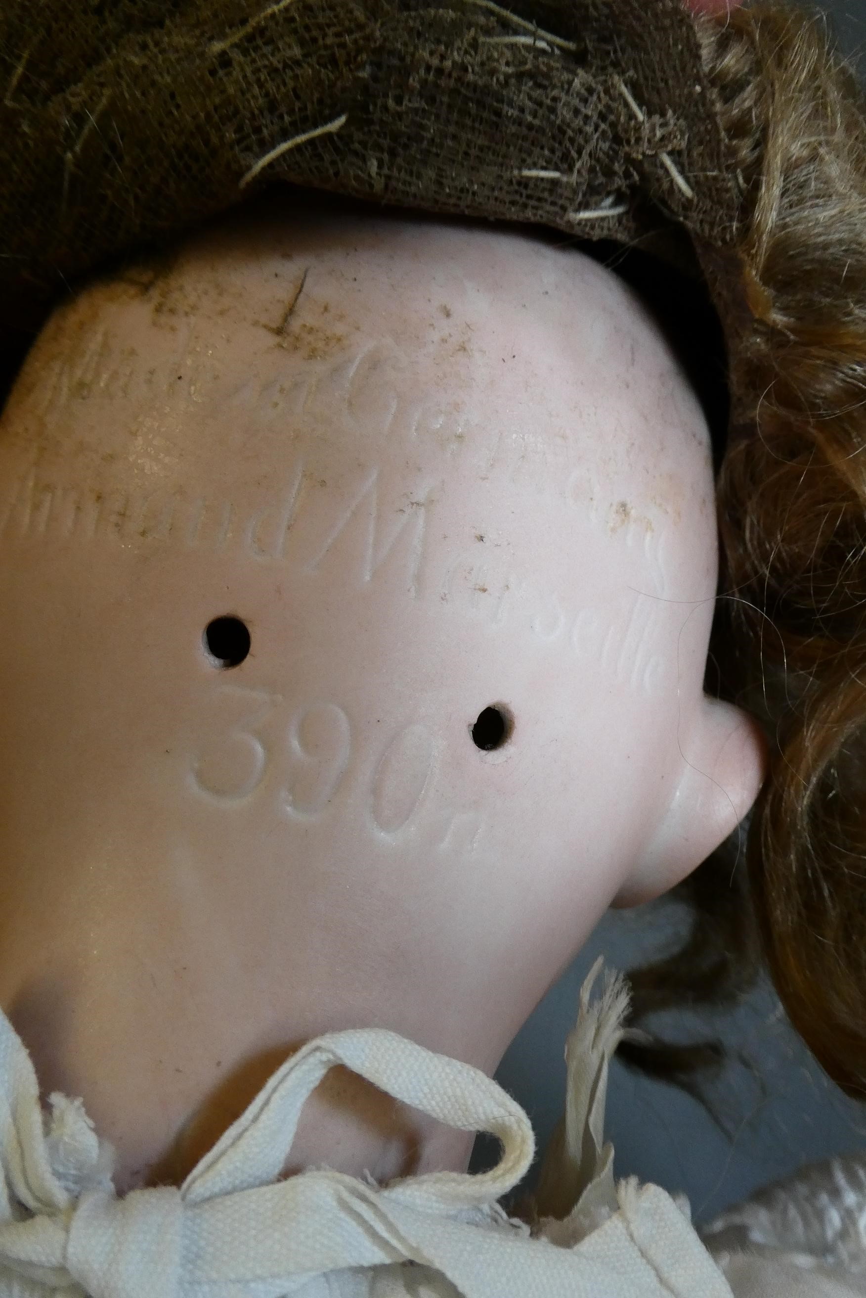 An Armand Marseille bisque socket head doll Image