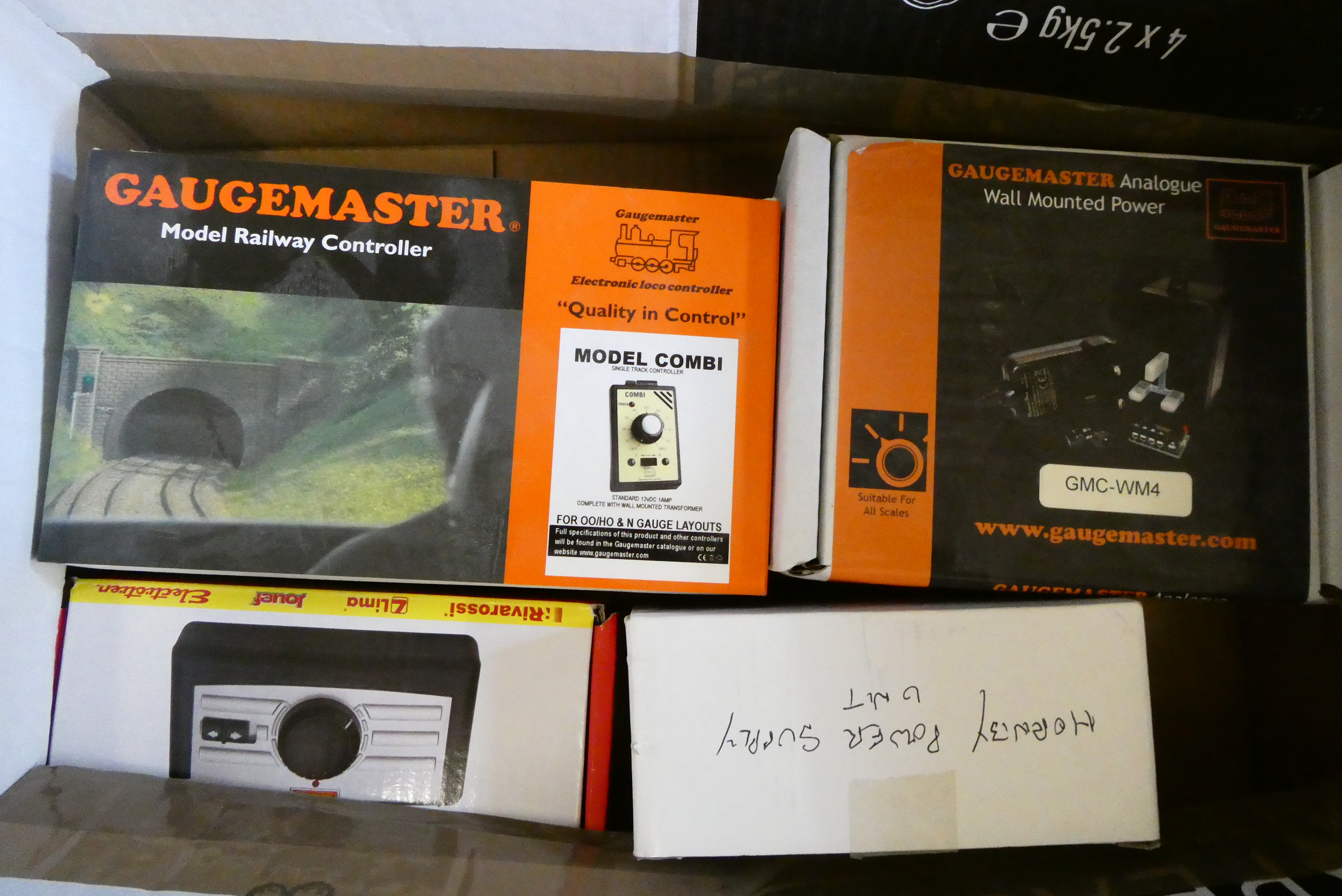 Four Gauge Master and Hornby 12v analogue train controllers and power supply, boxed, good to Image