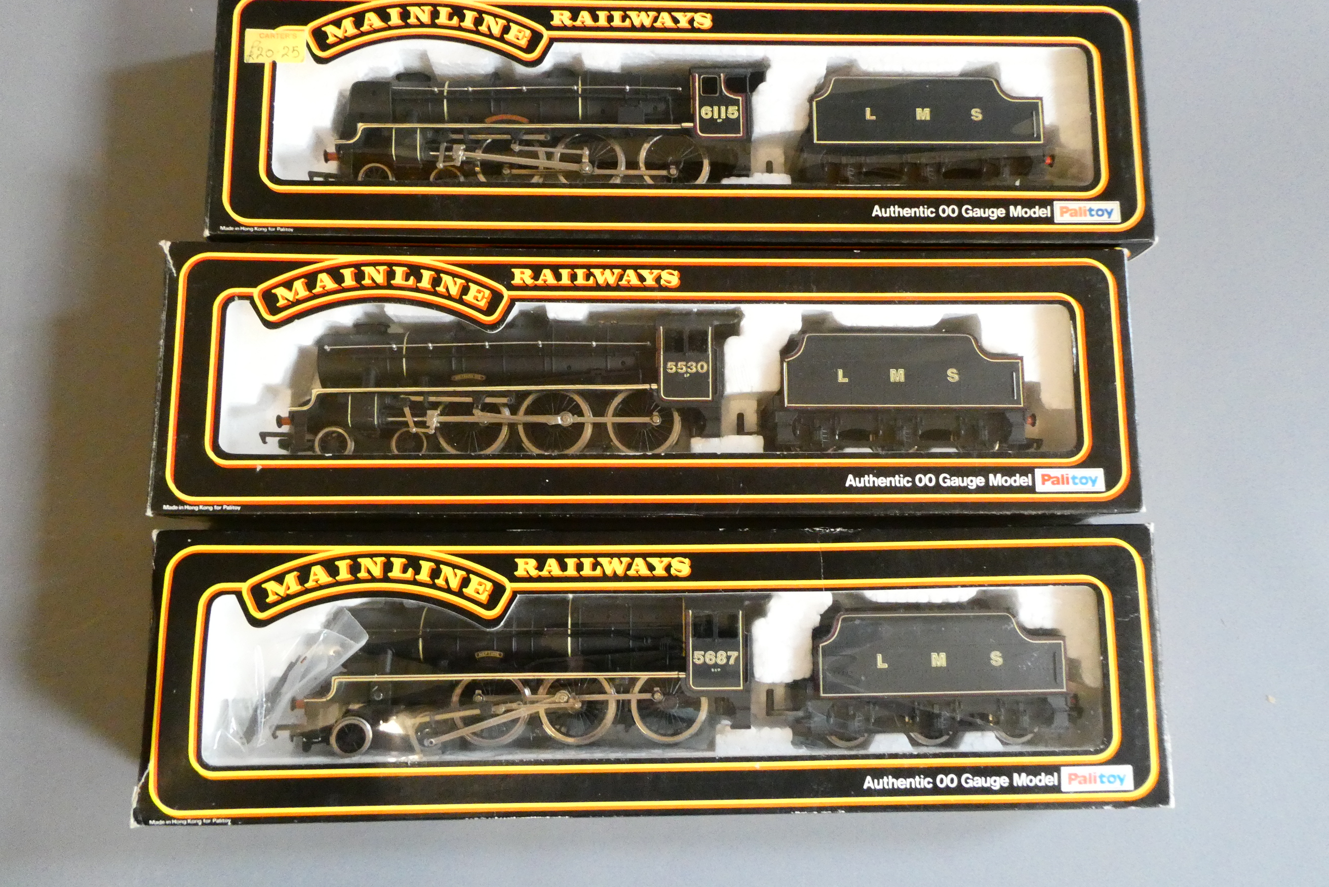 Three Mainline locomotives comprising Royal Scot locomotive in LMS black Scots Guardsman Image