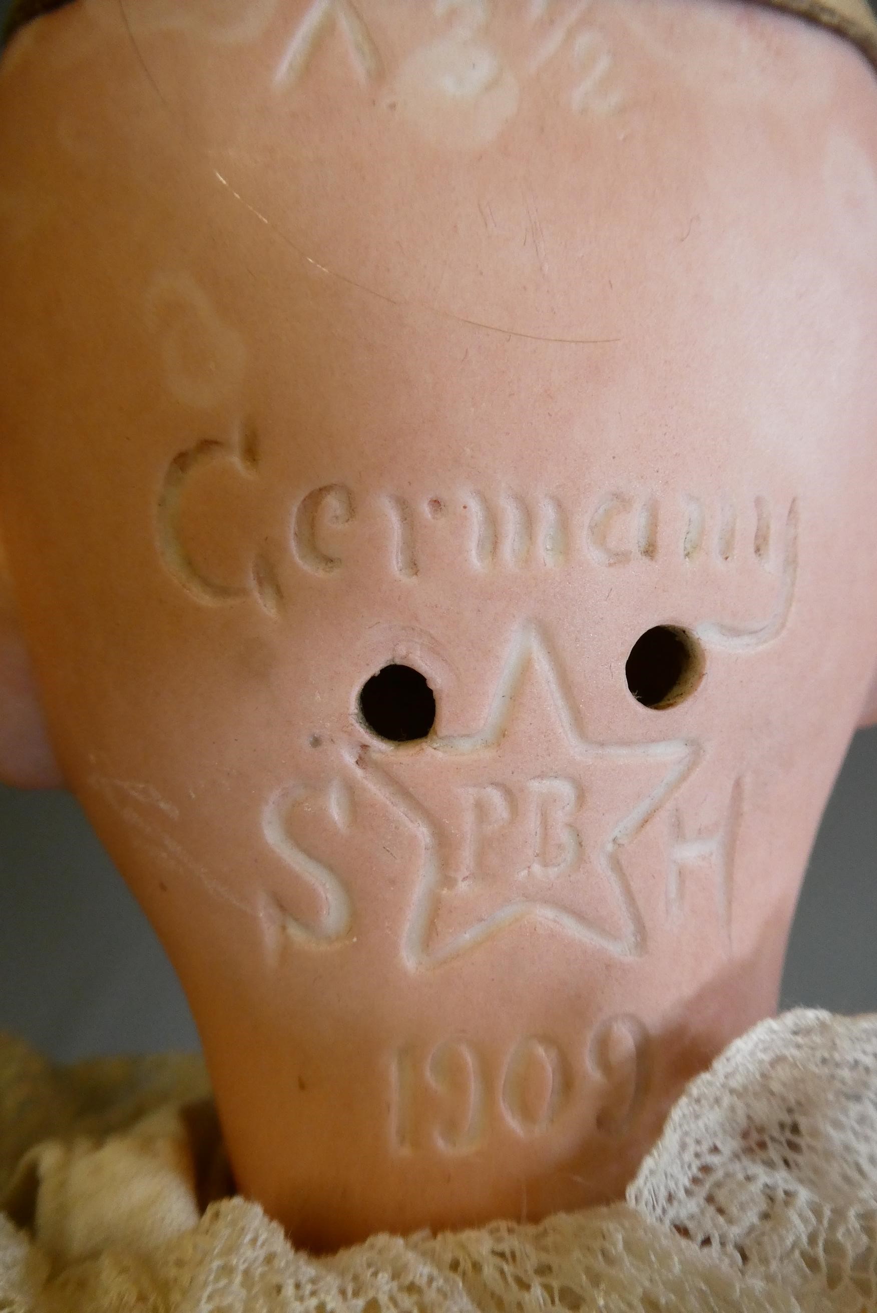 A Schoenau & Hoffmeister bisque socket head doll Image