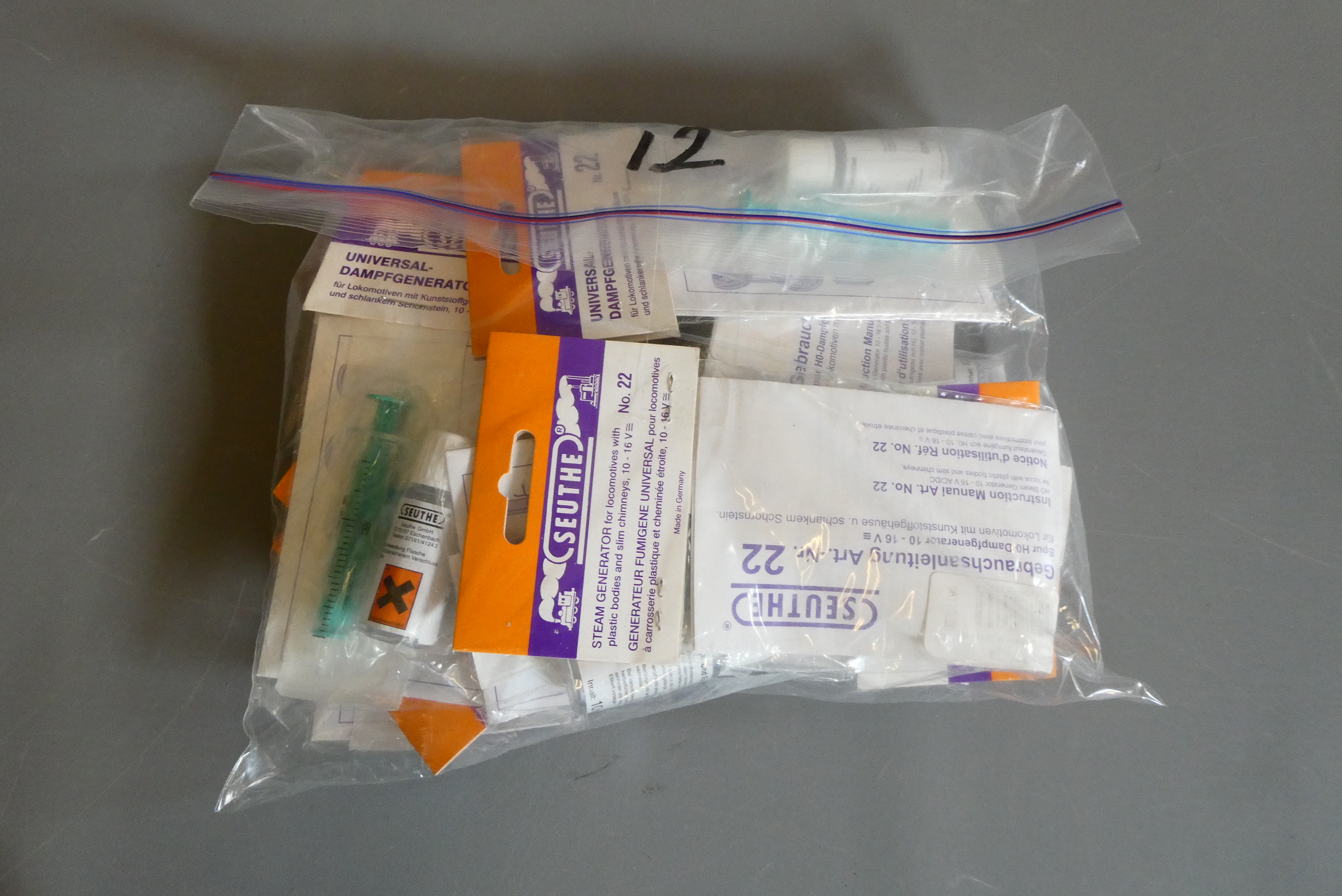 Twelve Seuthe smoke units for 00/HO models, mint (Est. plus 24% premium inc. VAT) Image