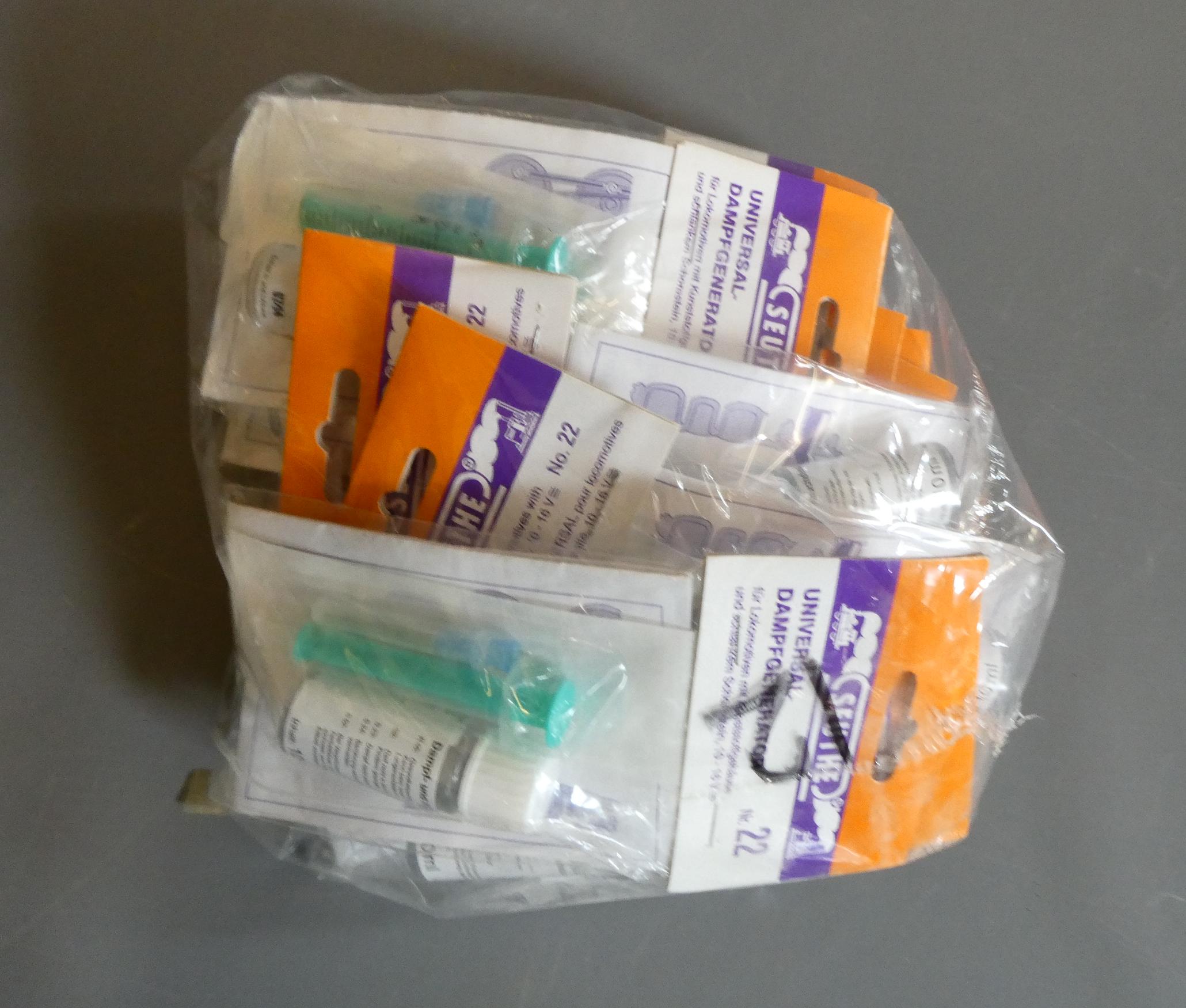 Twelve Seuthe smoke units for 00/HO models, mint (Est. plus 24% premium inc. VAT) Image