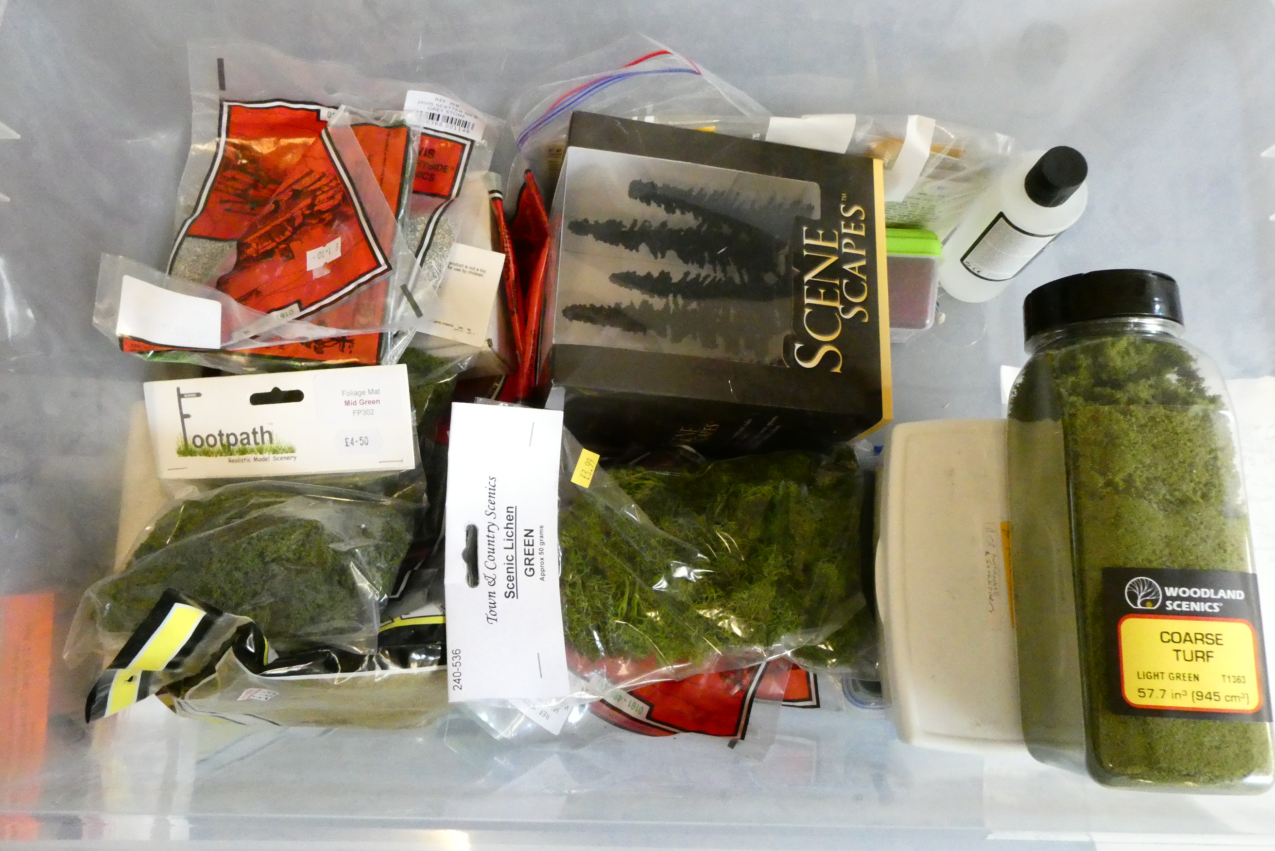 Model railway scenic items including flocks, grass mats and line side accessories. Most items new Image