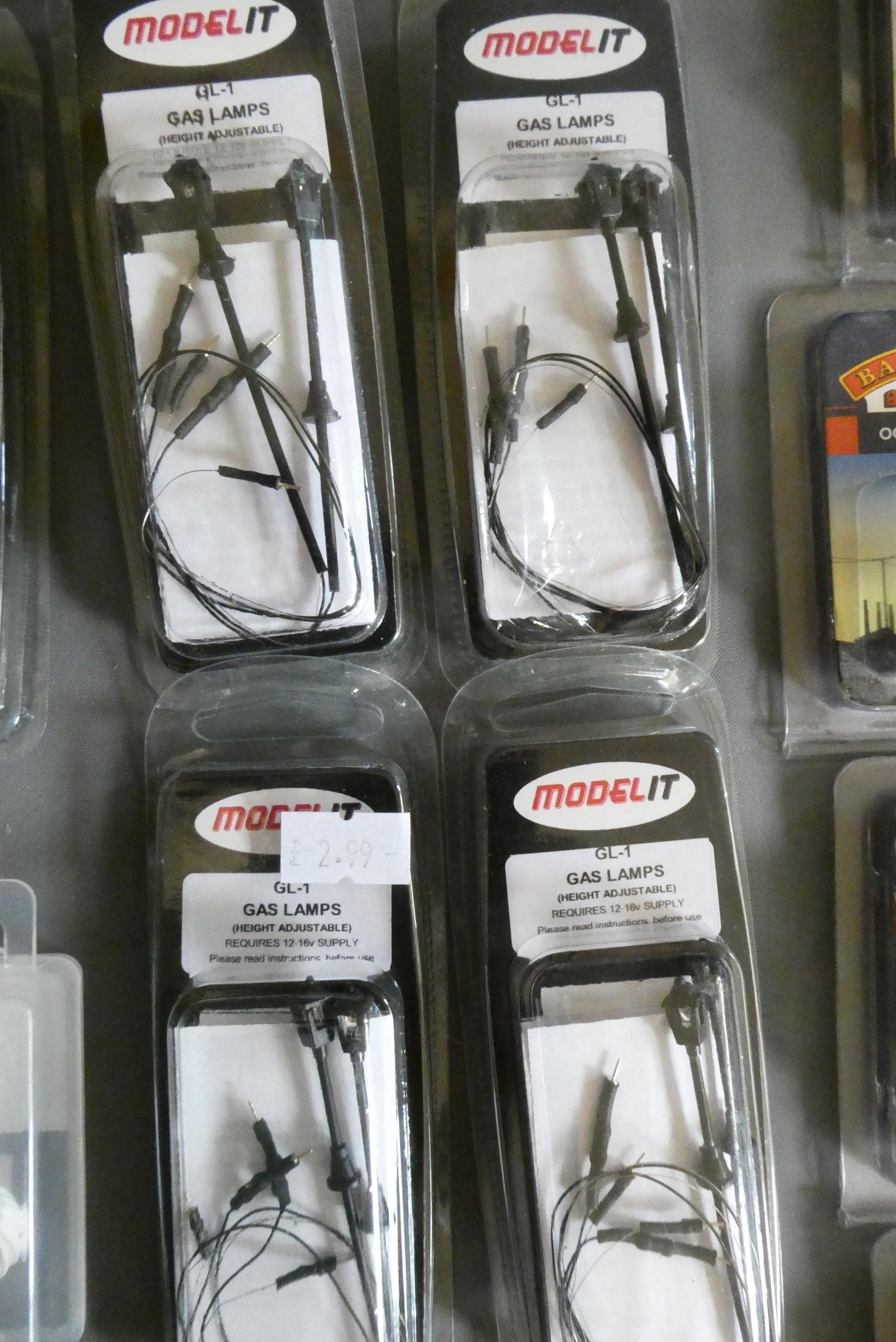 Bachmann Railway staff, civilian figures and animals together with small model gas lamps for 12 Image