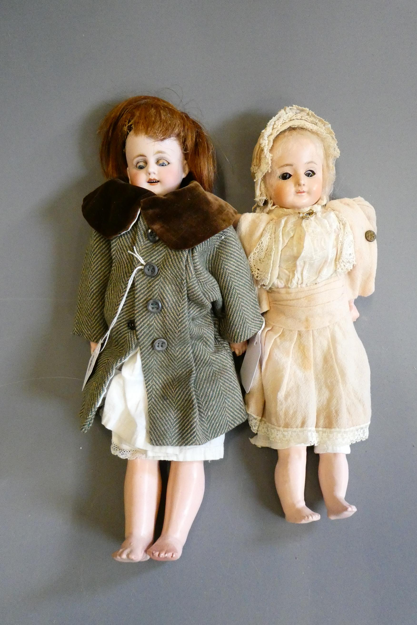 Two shoulder head dolls Image