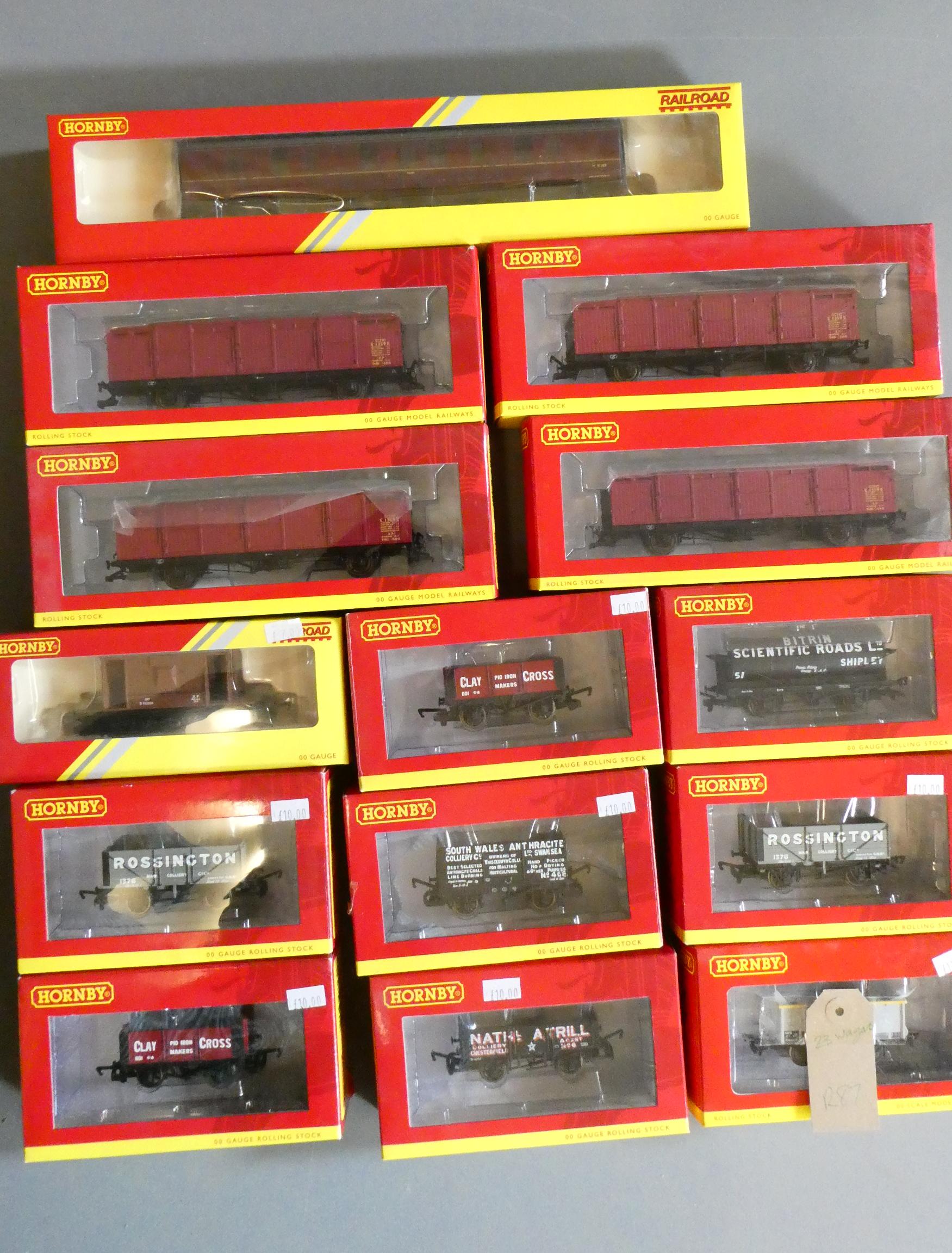 Twenty four Hornby goods wagons, all items boxed, excellent to mint (Est. plus 24% premium inc. VAT) Image