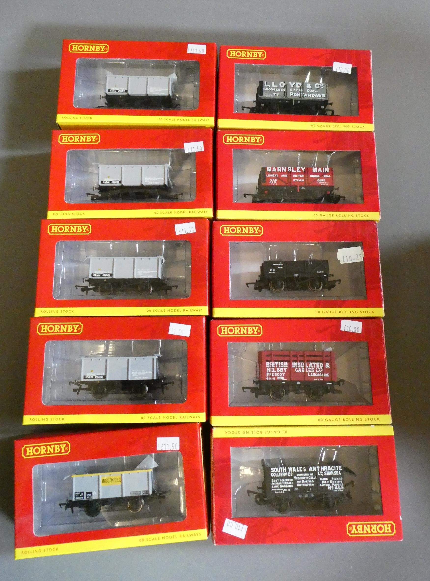 Twenty four Hornby goods wagons, all items boxed, excellent to mint (Est. plus 24% premium inc. VAT) Image